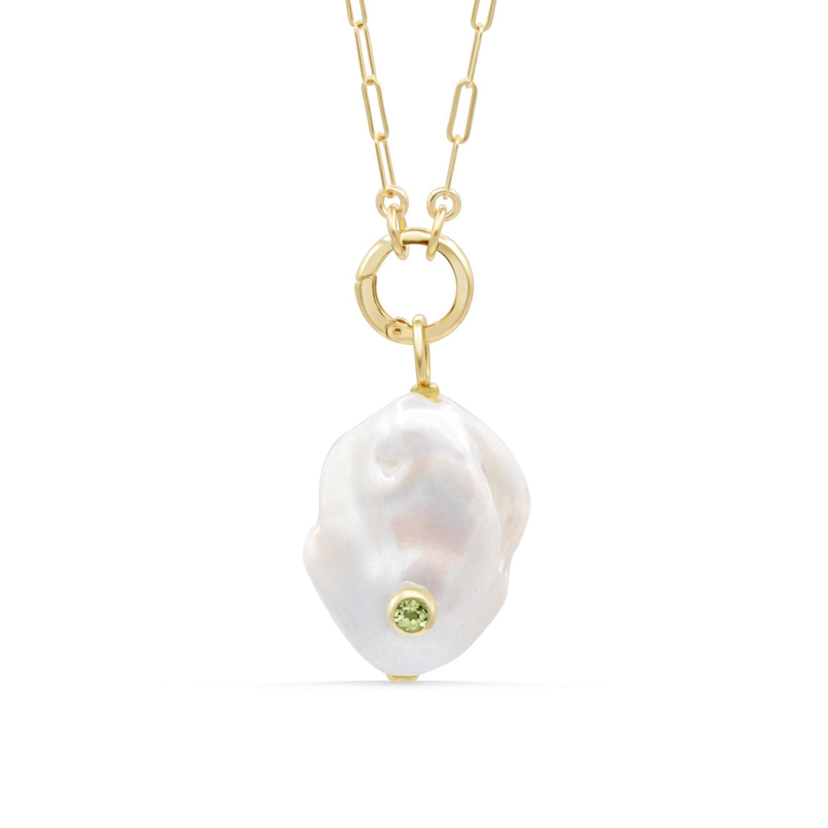 Lumen Baroque Pearl and Peridot necklace by Earthly Abundance featuring a string of irregular pearl and green peridot gemstones.