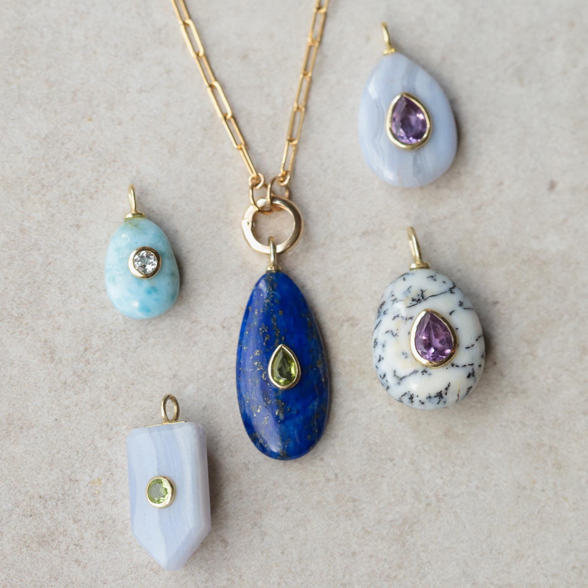 Soft horizon blue lace and Peridot gemstone necklace by Earthly Abundance featuring delicate lace and vibrant green gemstones.