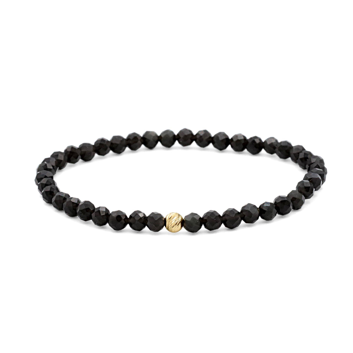 Black Obsidian bracelet with 4mm beads from Earthly Abundance, featuring smooth, polished black stones on an elastic cord.