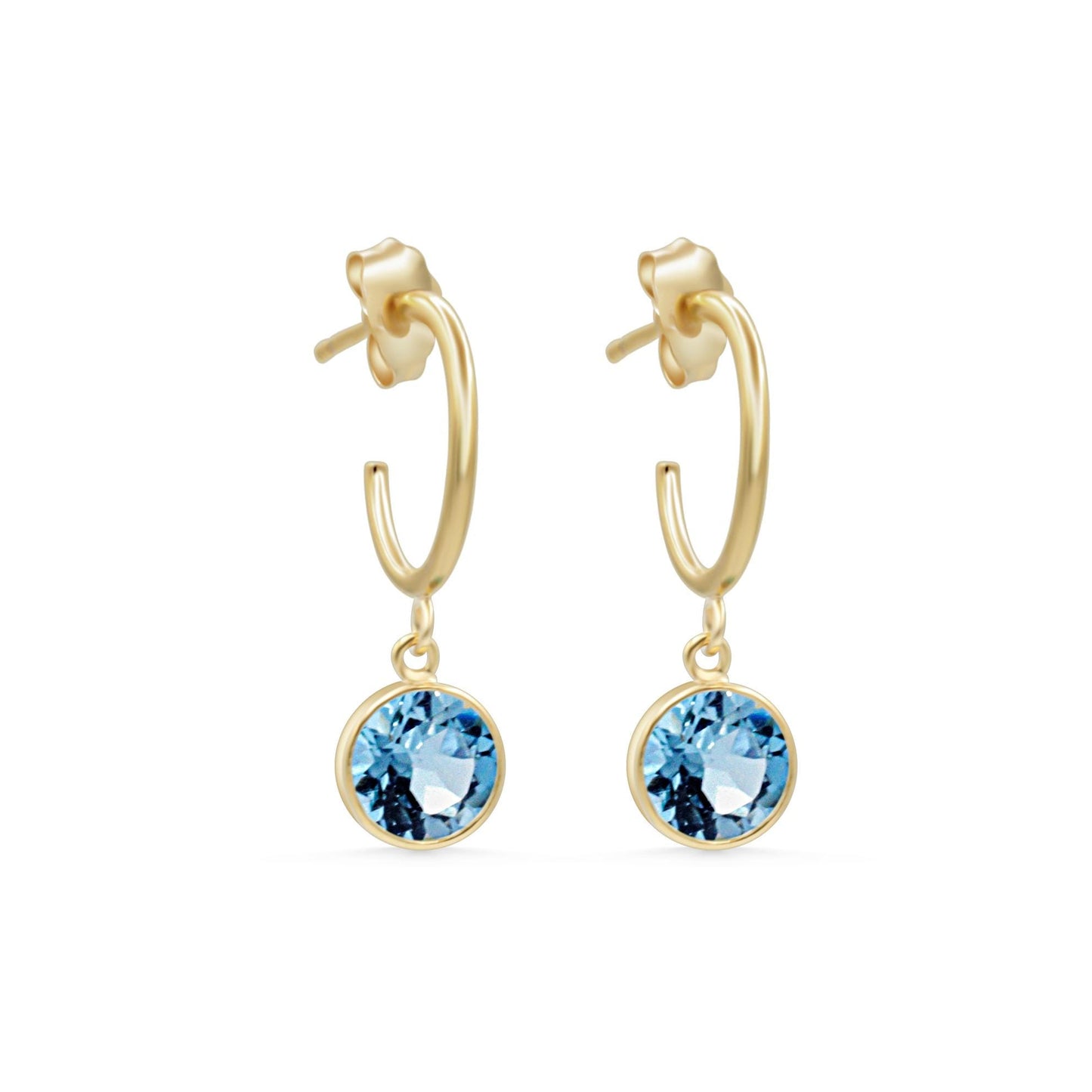 Sky blue topaz earrings with 14K gold-filled settings, featuring elegant, sparkling gemstones and a delicate, polished finish.