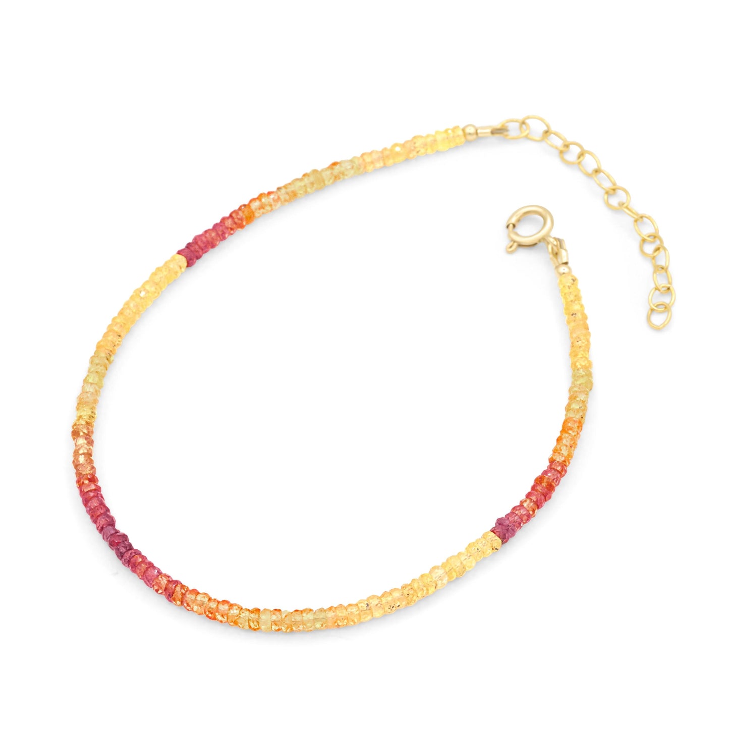 Pink and yellow Songea sapphire anklet with silver chain from Earthly Abundance, featuring vibrant gemstones and delicate design.