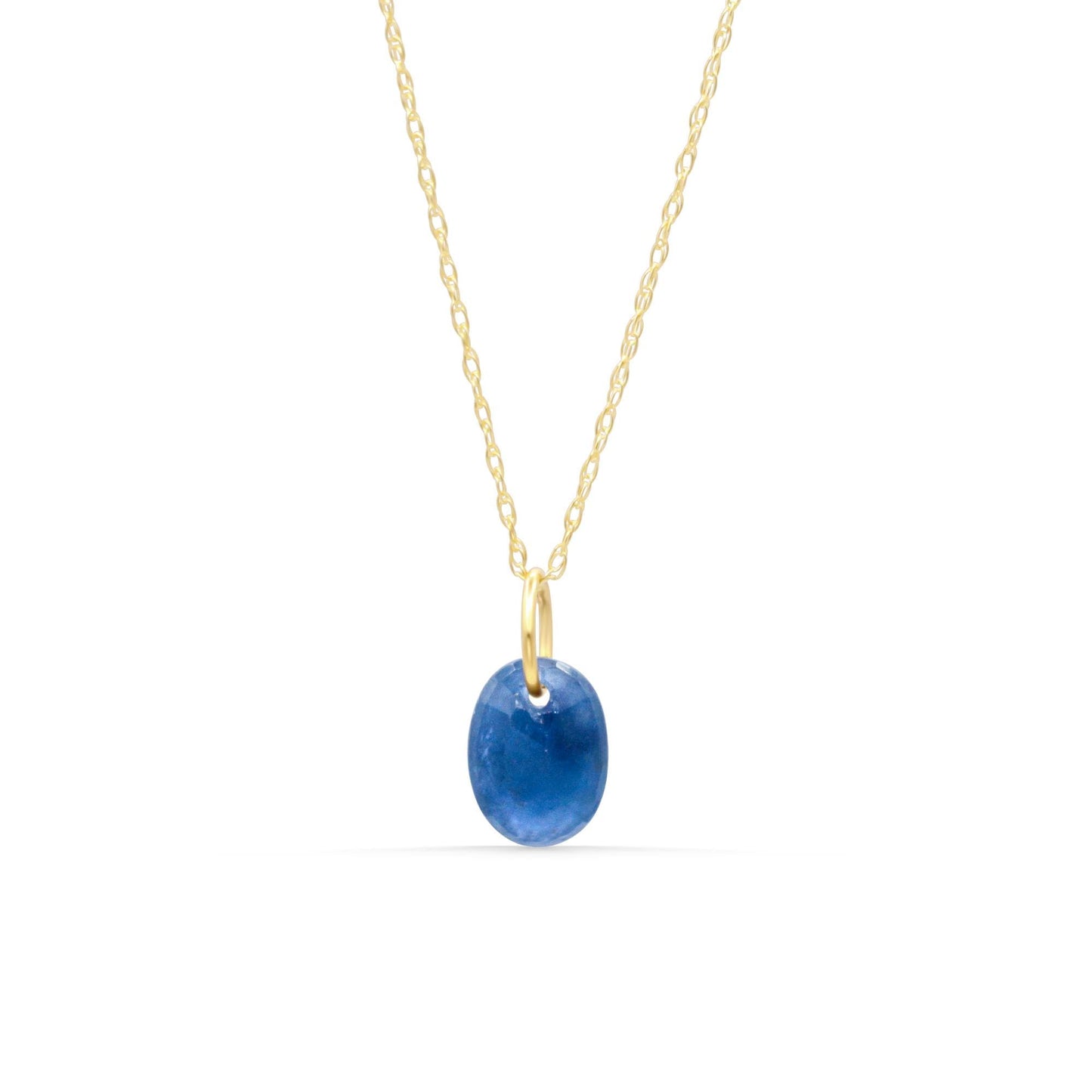 Blue sapphire pendant necklace in 14K gold with a delicate chain, featuring a vibrant blue sapphire gemstone.