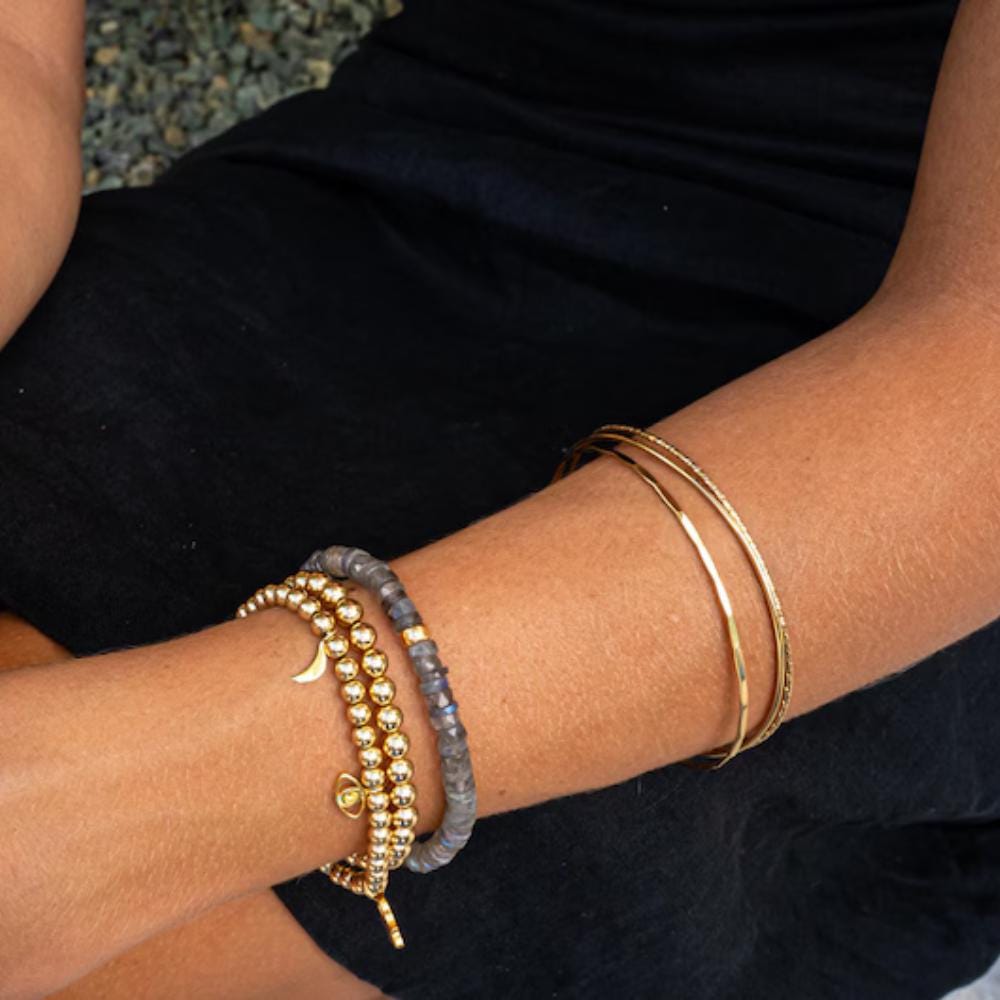 Labradorite Moon Heishi bracelet by Earthly Abundance featuring small round gemstone beads in iridescent hues.