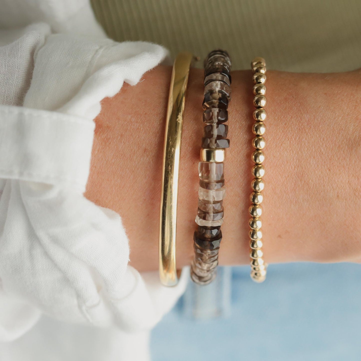 Smoky Quartz Heishi bracelet featuring small, natural smoky quartz beads on a flexible strand, handmade by Earthly Abundance.