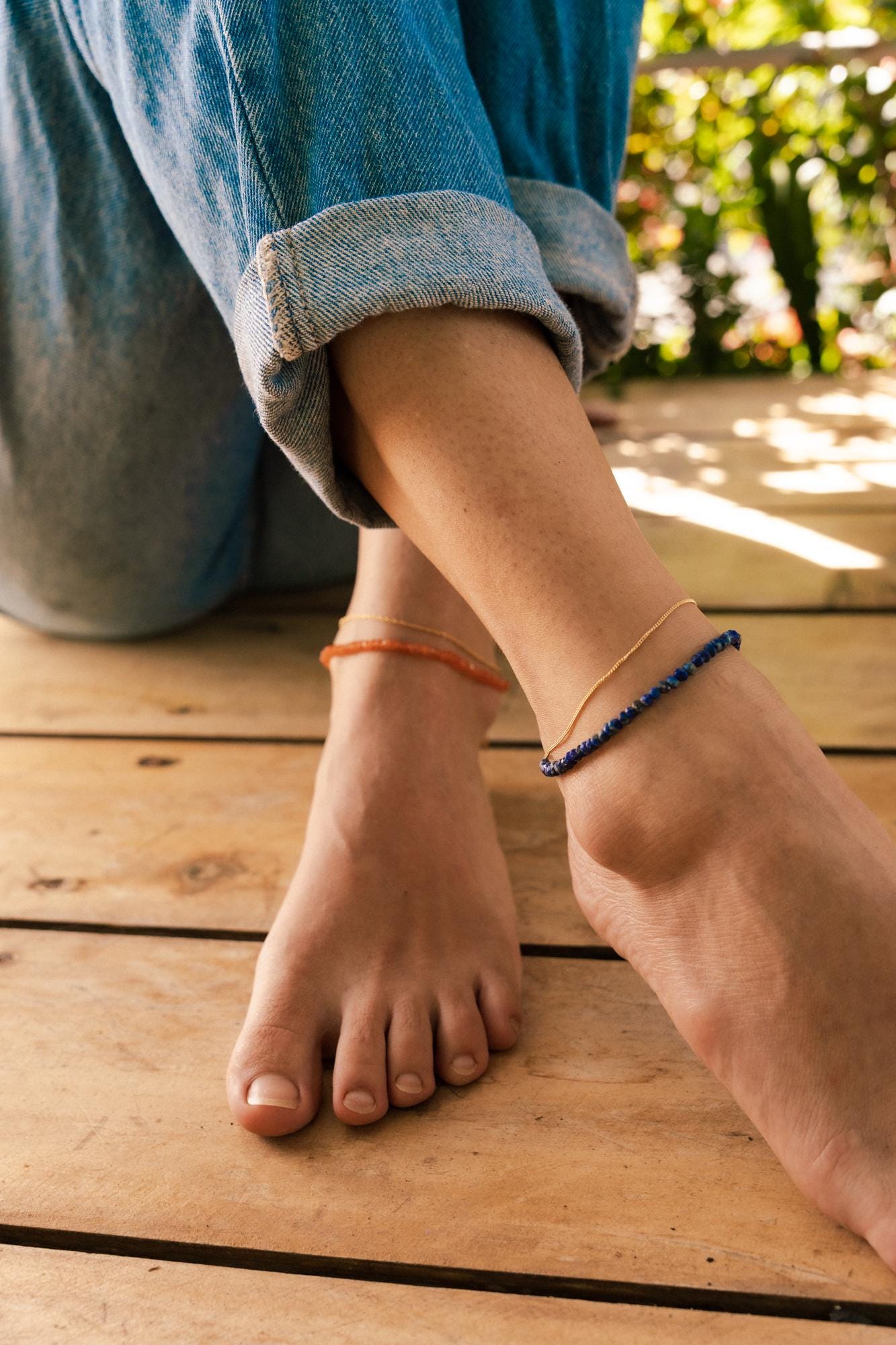 Lapis Lazuli anklet with 14K gold filled chain from Earthly Abundance, featuring blue gemstone beads and delicate gold accents.