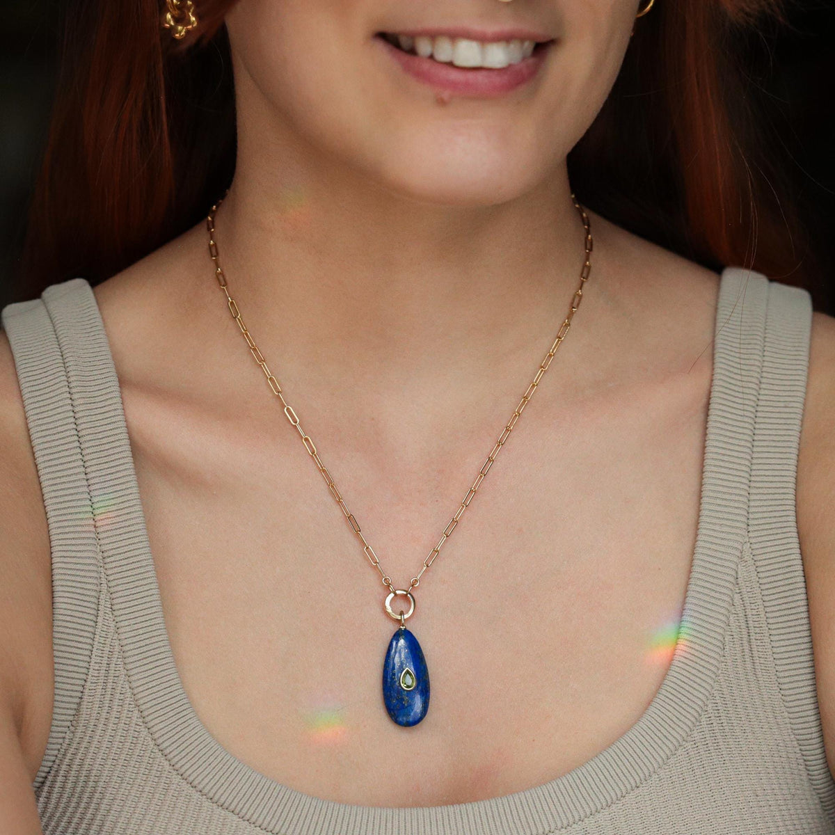Earthly Abundance Quiet Sky Pendant Carabiner Necklace featuring a sleek sky-themed pendant on a sturdy chain.