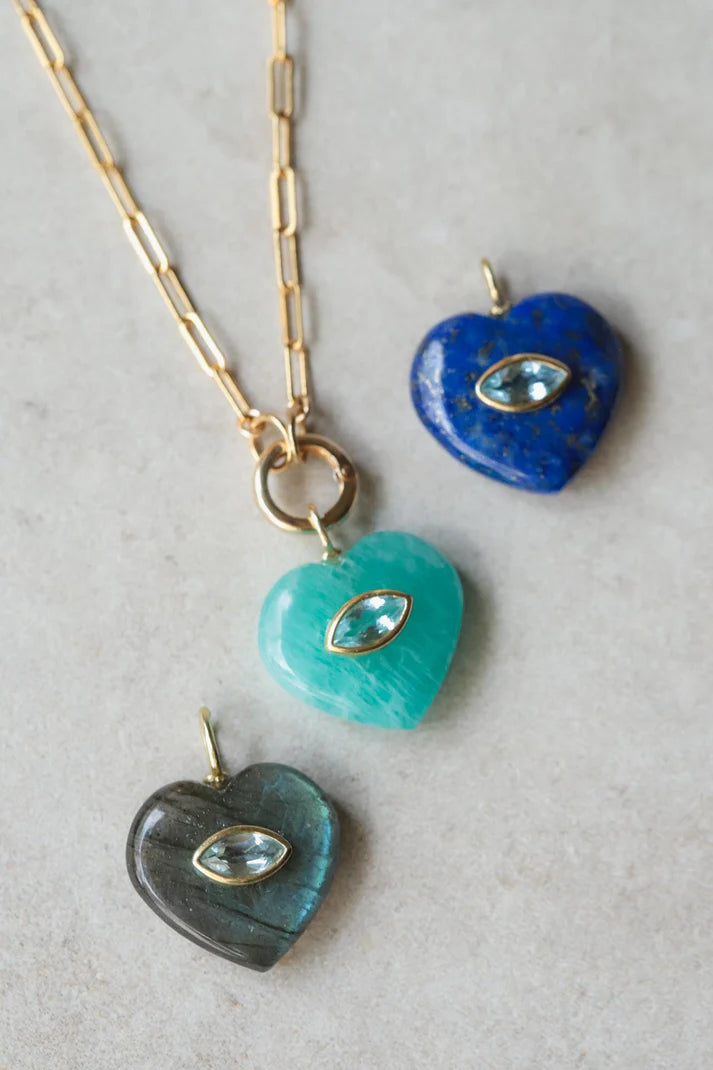Midnight Heart Pendant featuring Lapis Lazuli and Blue Topaz stones on a silver chain, from Earthly Abundance.