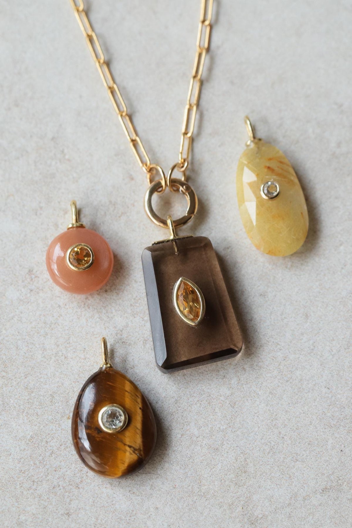 Golden depth smoky quartz necklace featuring a polished pendant on a delicate chain by Earthly Abundance.