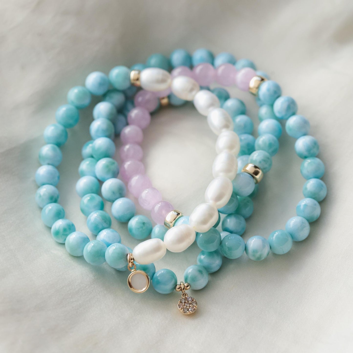 Rare Beauty Larimar bracelet featuring blue larimar stones on a delicate silver chain, stylish jewelry by Earthly Abundance.