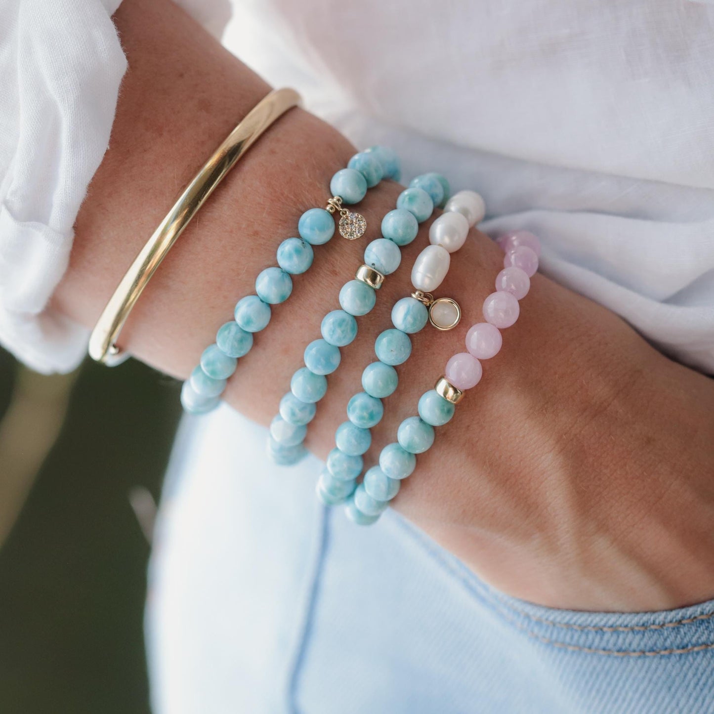 Larimar and diamond bracelet by Earthly Abundance featuring a delicate silver chain and sparkling gemstone accents.