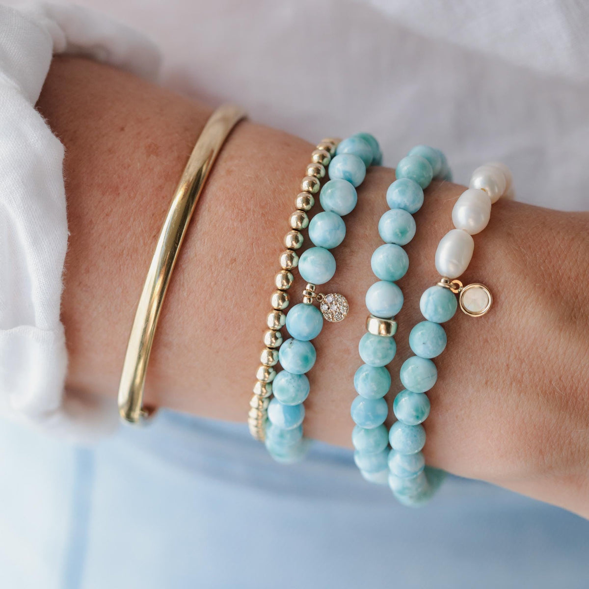 Rare Beauty Larimar bracelet by Earthly Abundance featuring polished larimar stones on a delicate chain.