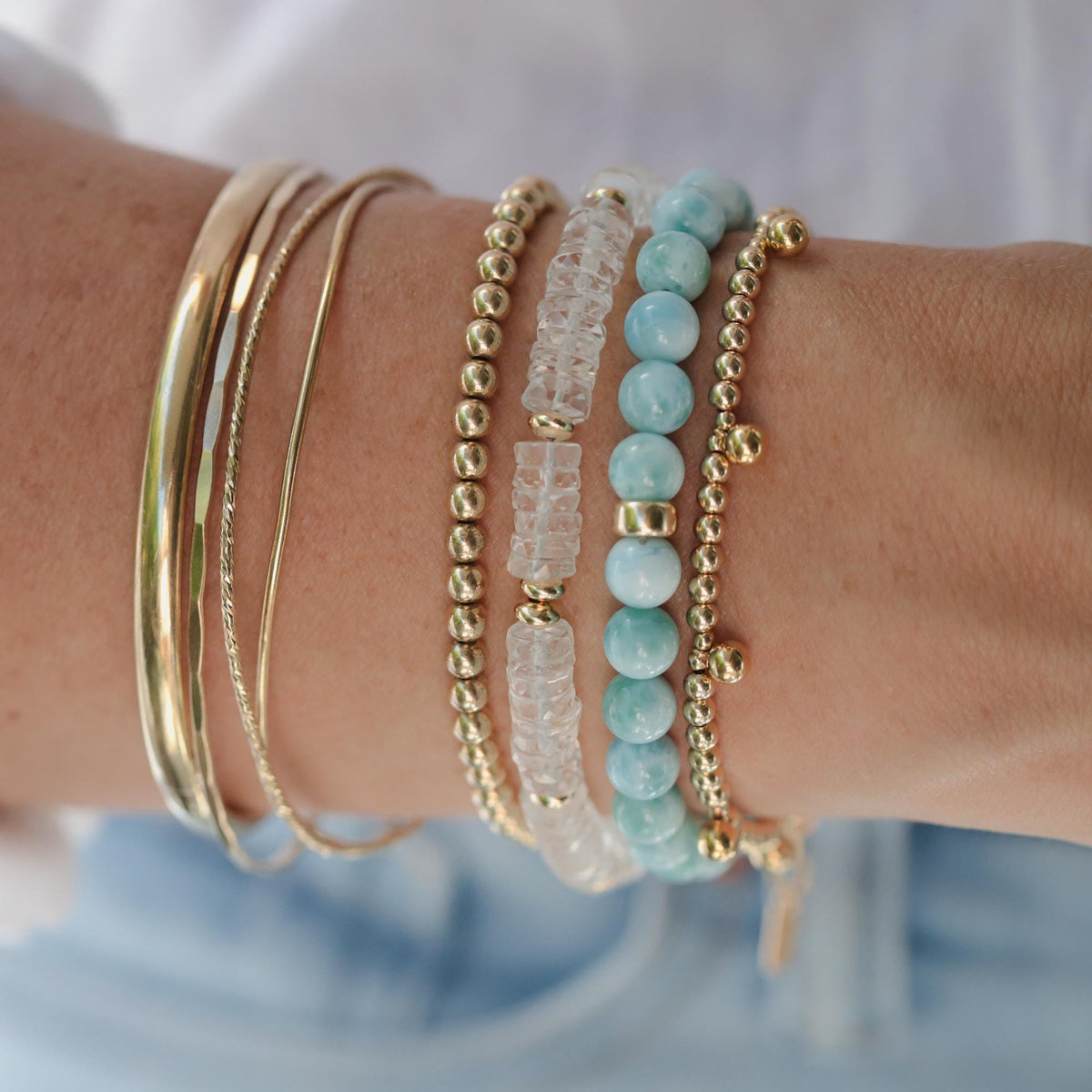 Rare Beauty Larimar bracelet by Earthly Abundance featuring blue larimar stones on a delicate silver chain.