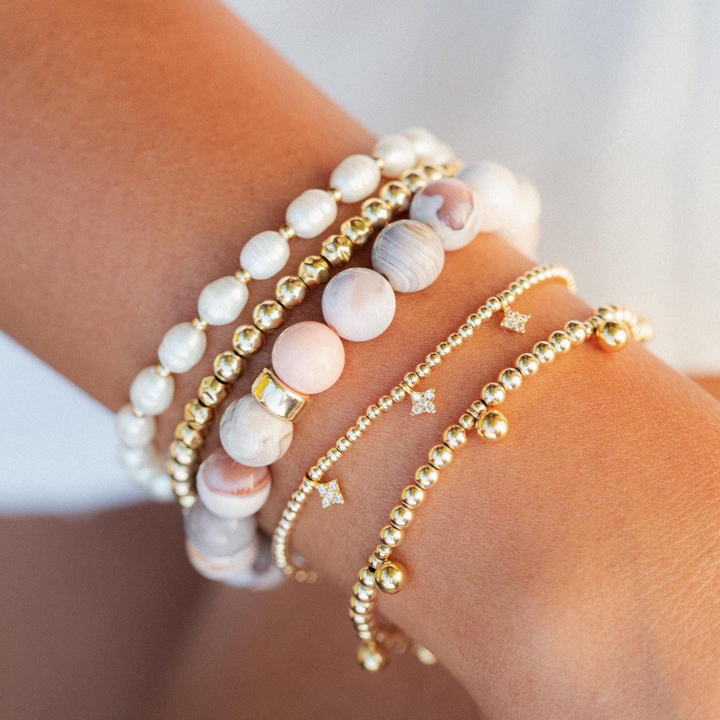 Soft Radiance Pearl bracelet with 14K gold clasp from Earthly Abundance, featuring lustrous pearls on a delicate chain.