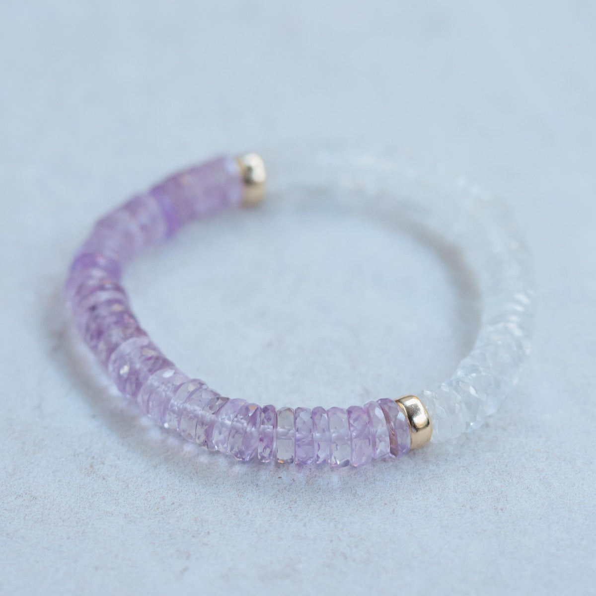 Topaz and pink amethyst heishi bracelet featuring colorful gemstone beads, handcrafted by Earthly Abundance.