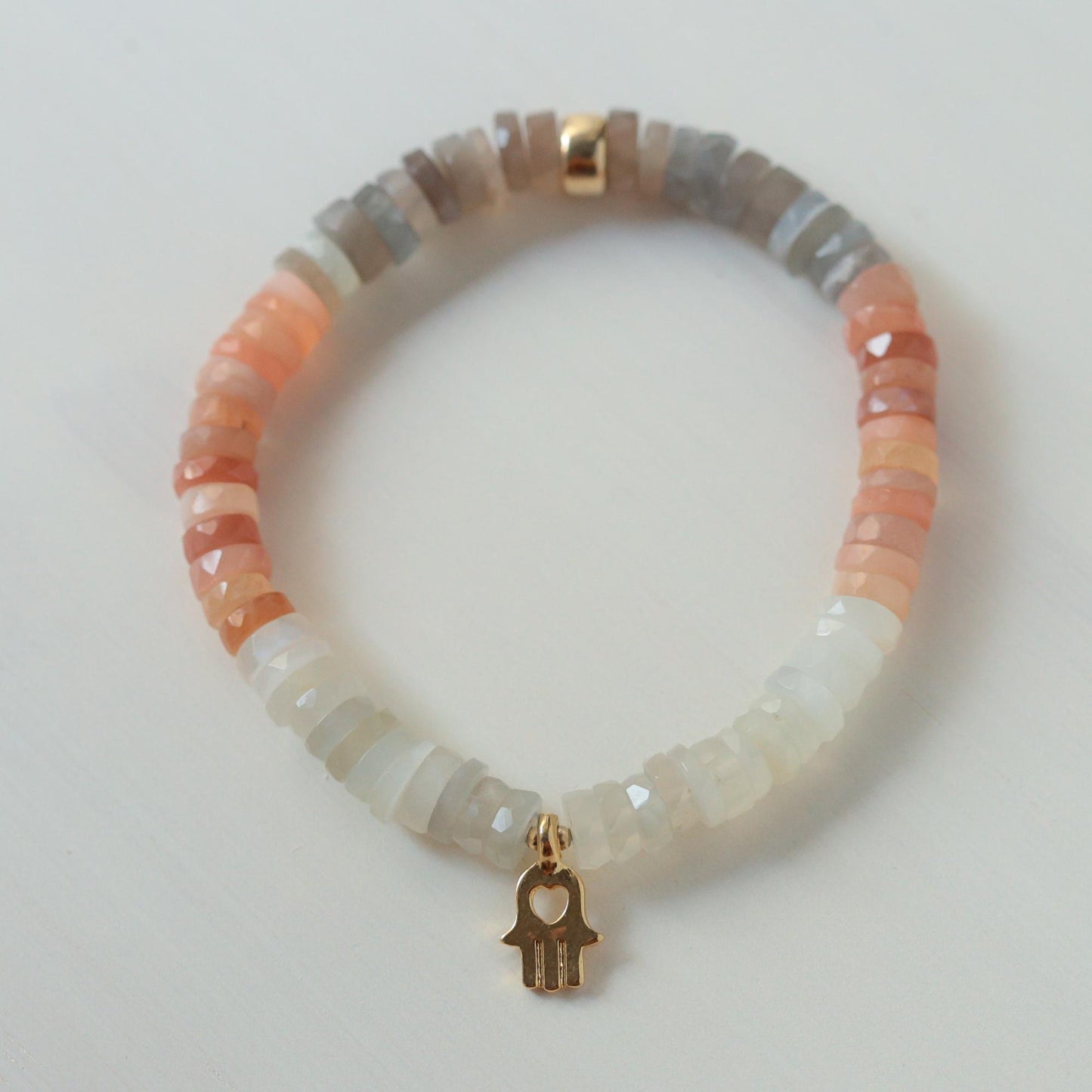 Mixed moonstone bracelet by Earthly Abundance featuring polished moonstone beads on a delicate elastic cord.