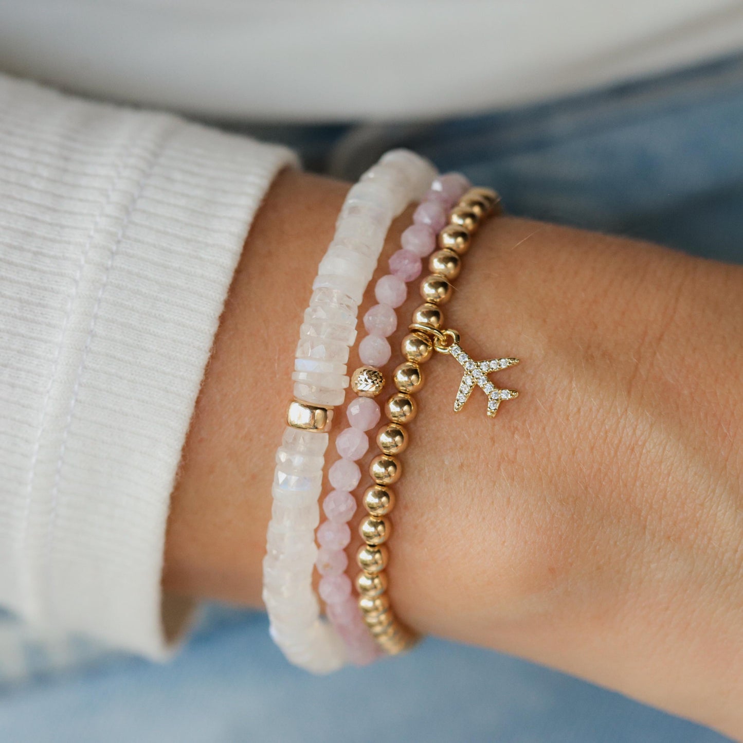 Rainbow Moonstone bracelet featuring celestial-inspired design by Earthly Abundance, showcasing shimmering moonstone beads and silver accents.