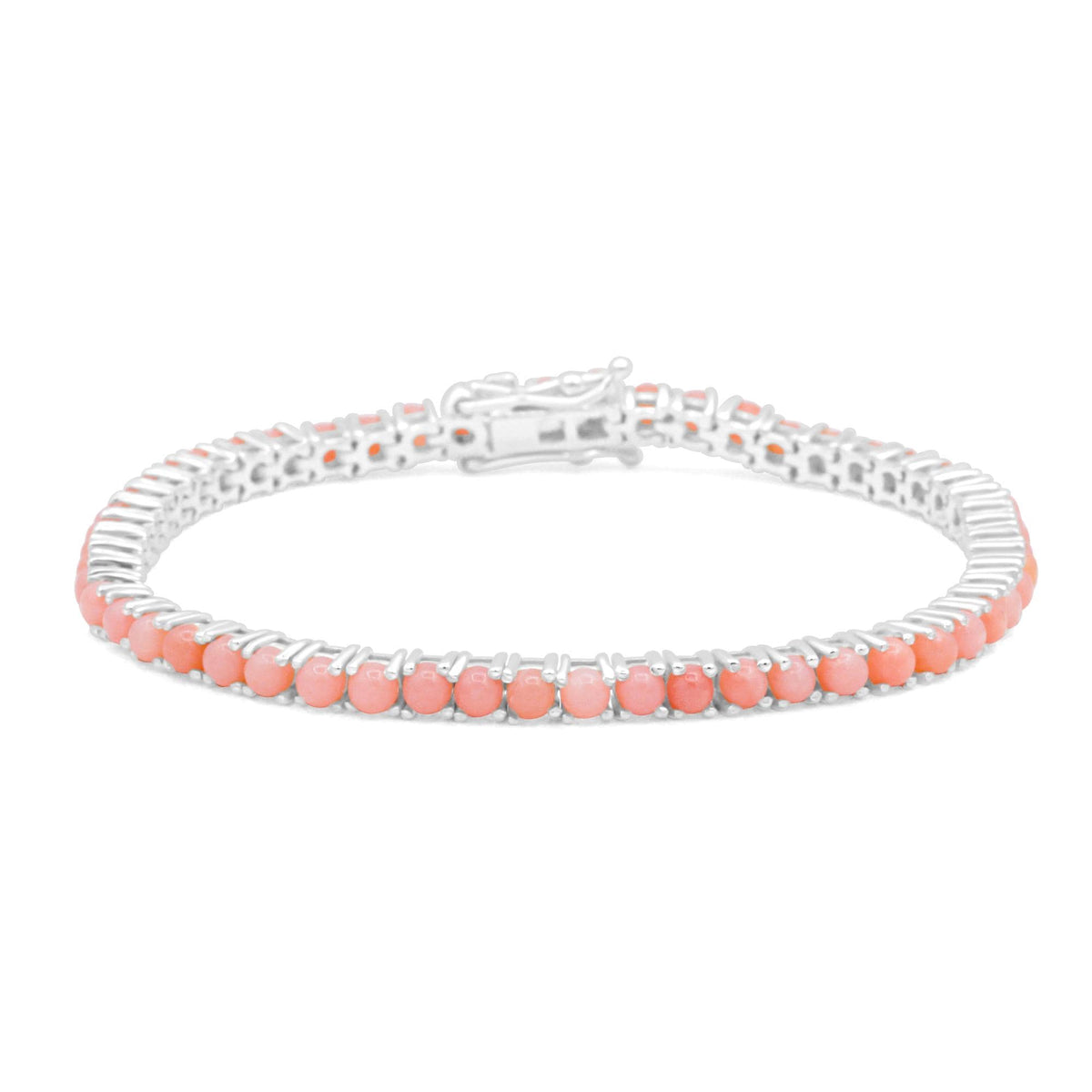Pink Opal Tennis Bracelet by Earthly Abundance featuring polished pink opal stones on a delicate silver chain.