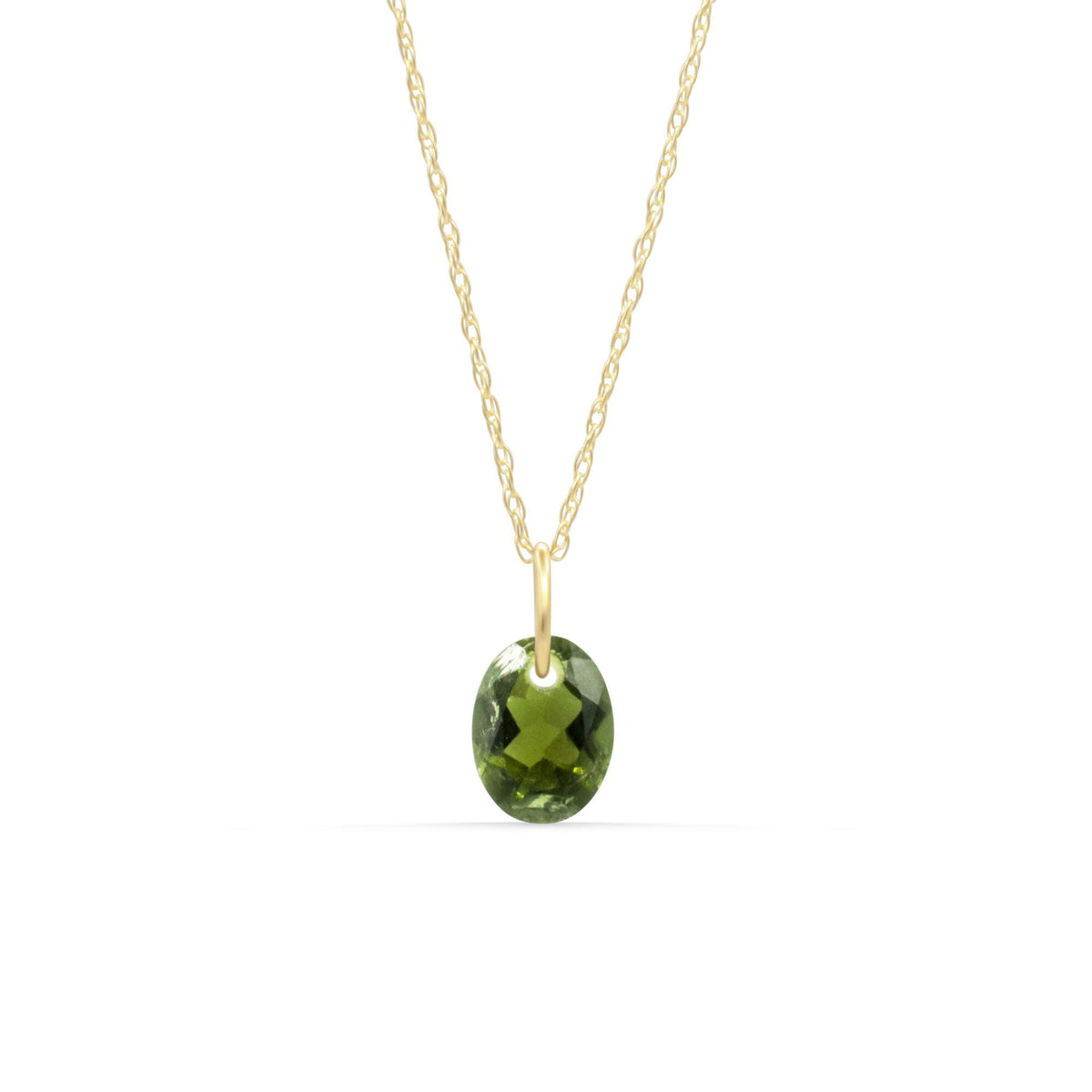Green tourmaline pendant in 14K gold setting with a delicate chain, showcasing a vibrant green gemstone.