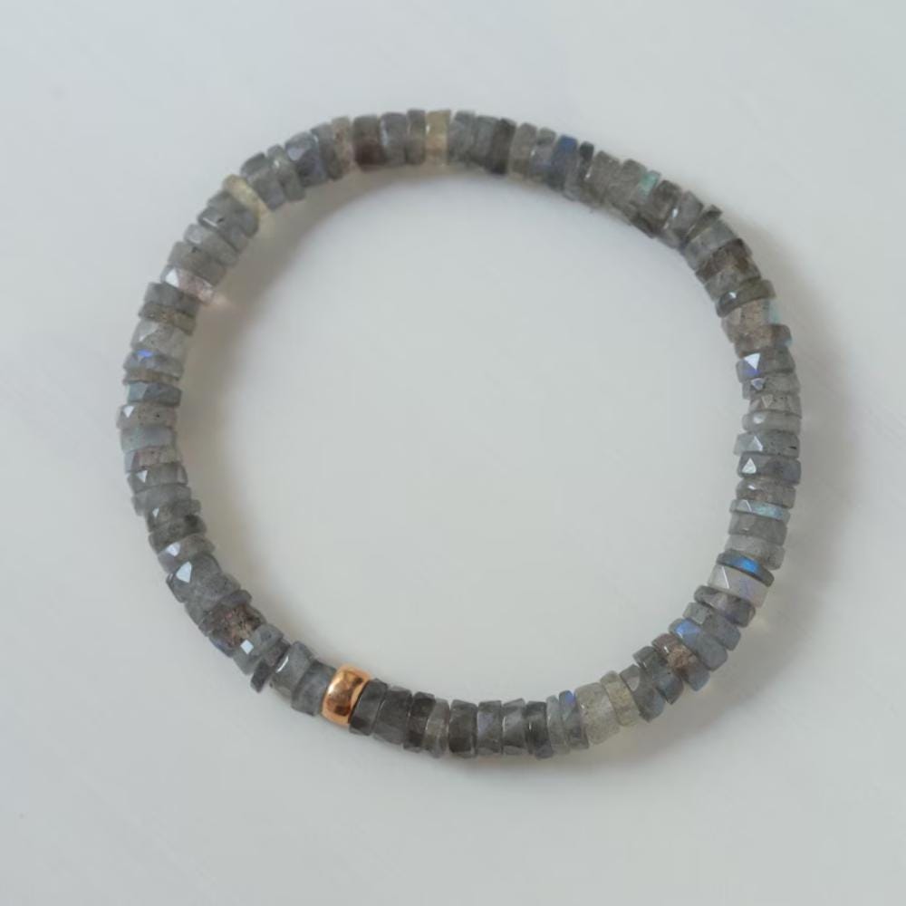 Labradorite Moon Heishi bracelet by Earthly Abundance featuring round faceted labradorite beads on a stretch cord.