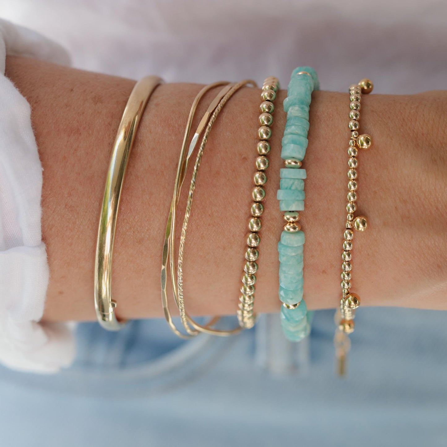 Calm Energy Amazonite Heishi bracelet featuring smooth, round Amazonite beads on a stretch cord, designed for jewelry wear.