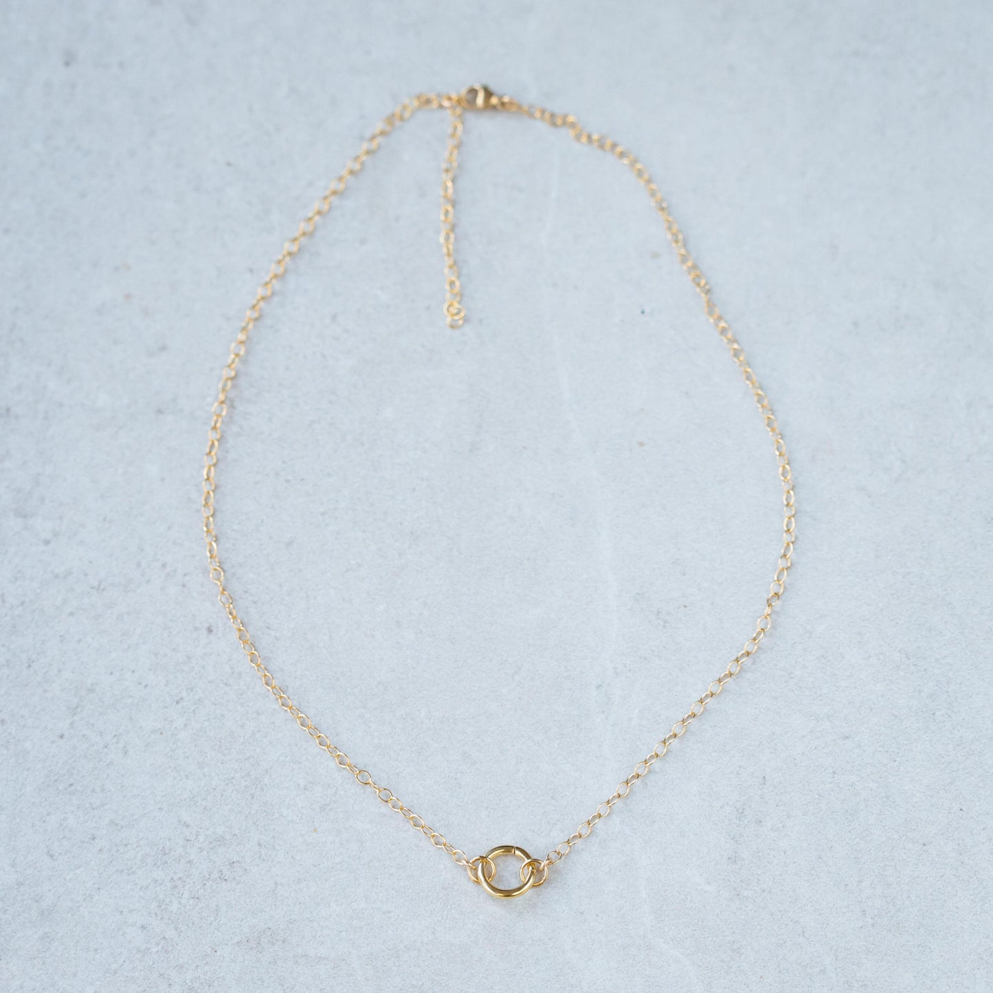 14K gold filled cable chain necklace from Earthly Abundance, close-up of the delicate, shiny chain links.