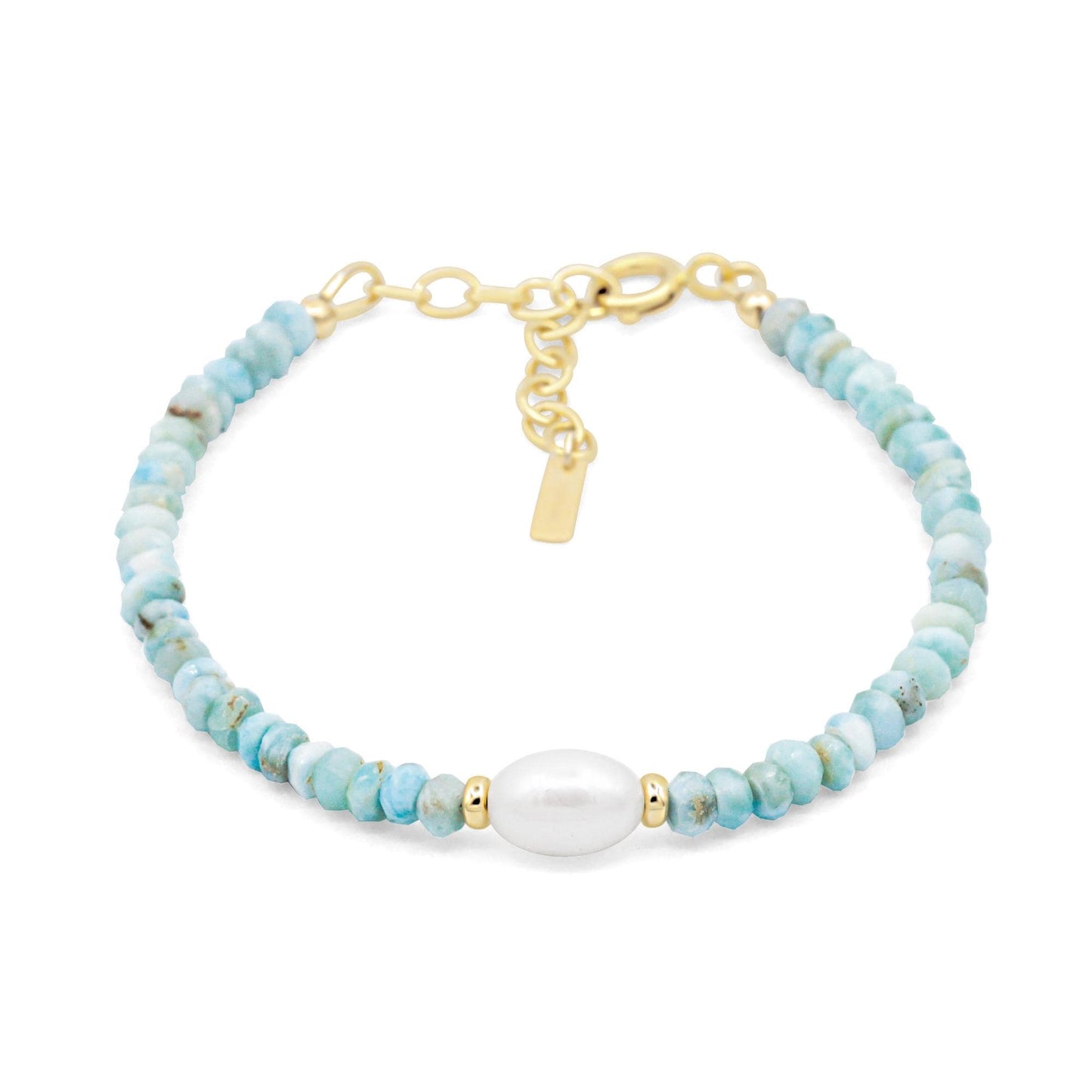 Soft ocean larimar pearl bracelet featuring smooth blue larimar beads and delicate silver accents, crafted by Earthly Abundance.