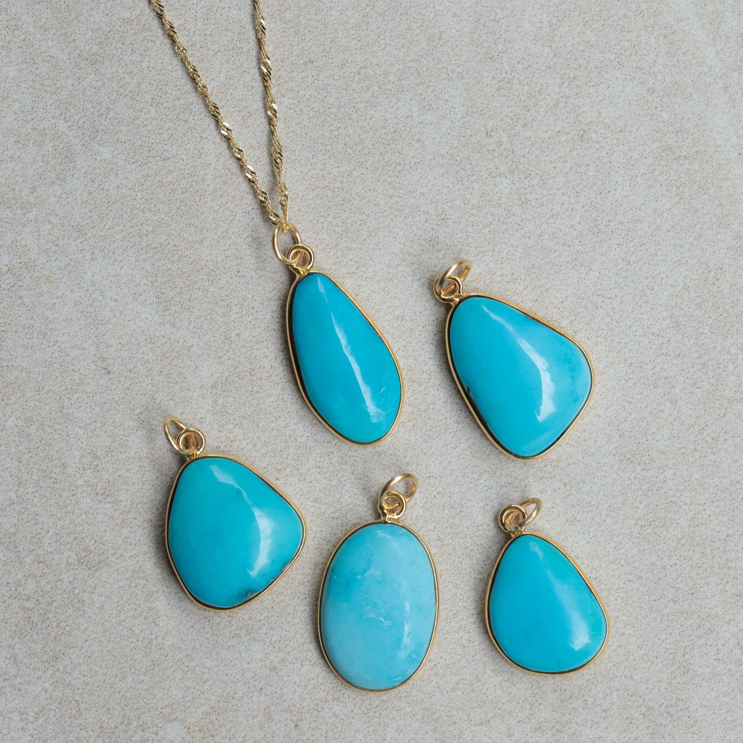 Sacred Energy Sleeping Beauty Turquoise gemstone from Earthly Abundance featuring vibrant blue-green color and natural matrix patterns.
