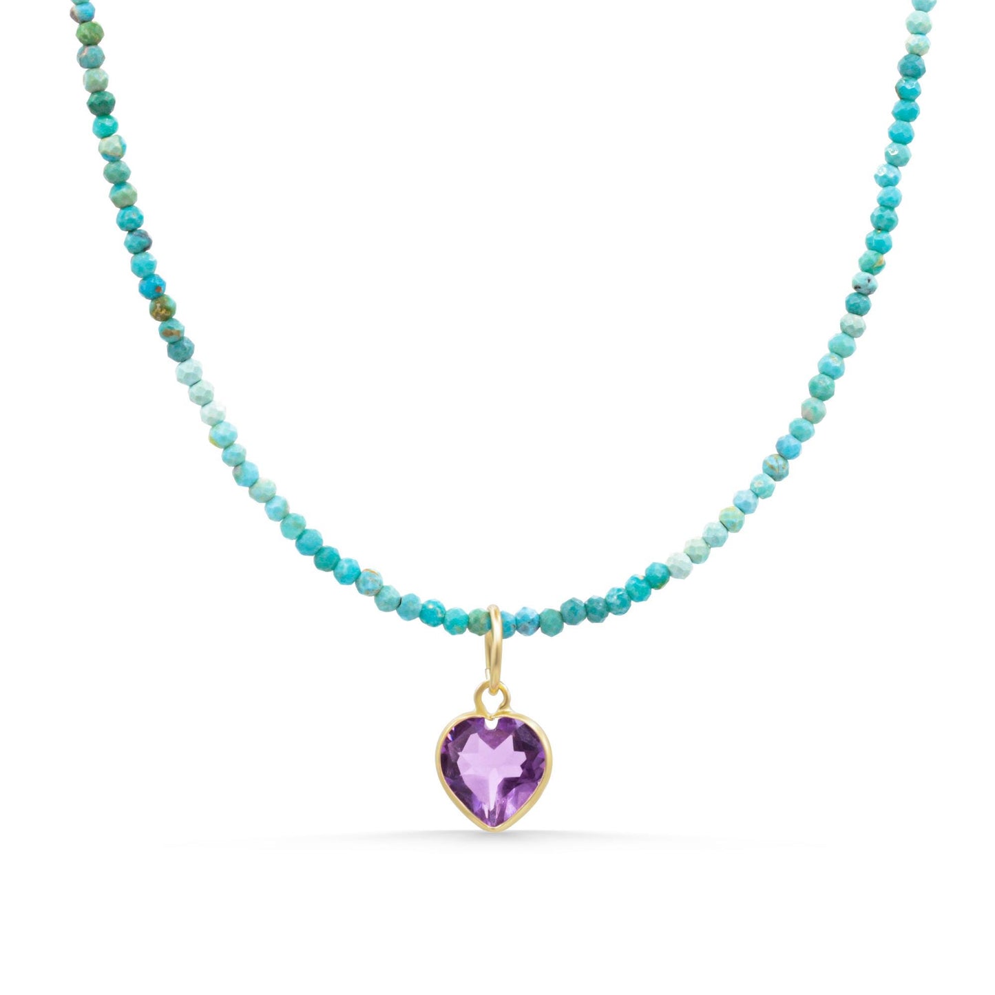 Turquoise and amethyst mermaid heart necklace from Earthly Abundance featuring a detailed pendant on a chain.