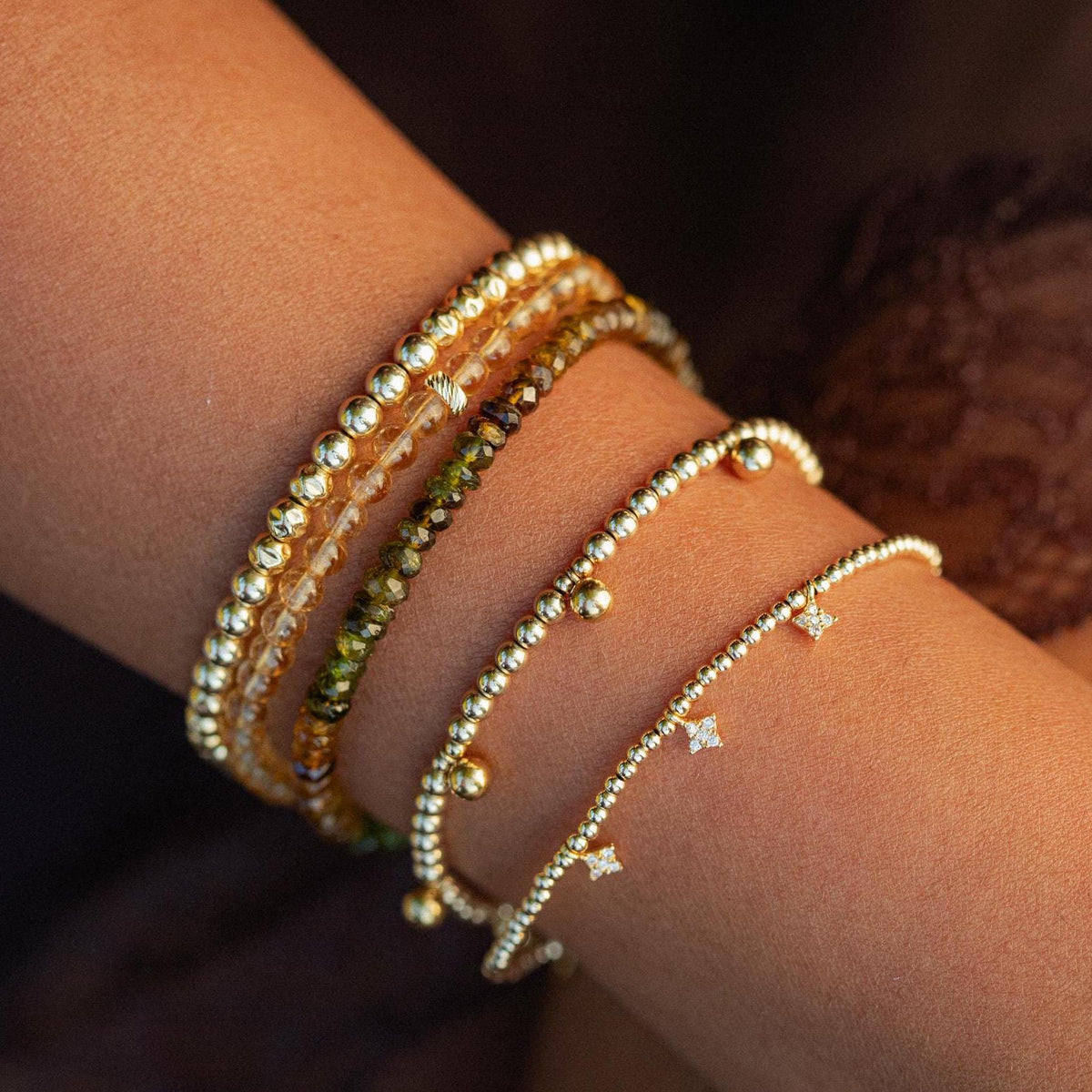 Earthly Abundance Solar Citrine bracelet with 14K gold accents, showcasing polished golden-yellow citrine gemstones.