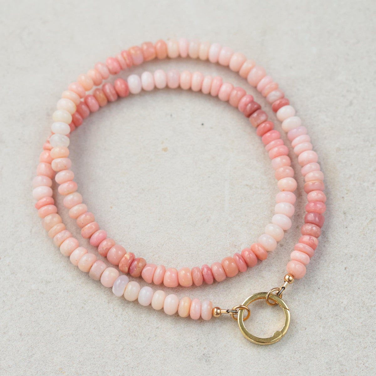 Cotton Candy Pink Opal Necklace by Earthly Abundance featuring a vibrant pink opal pendant on a delicate chain.
