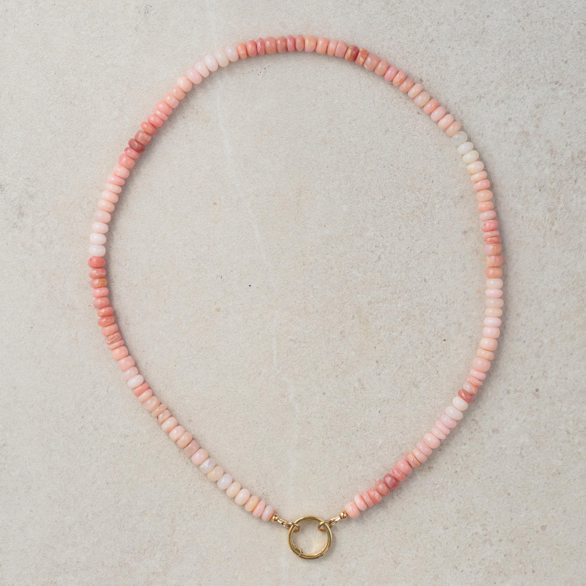 Cotton Candy Pink Opal Necklace by Earthly Abundance featuring a vibrant pink opal pendant on a delicate chain.
