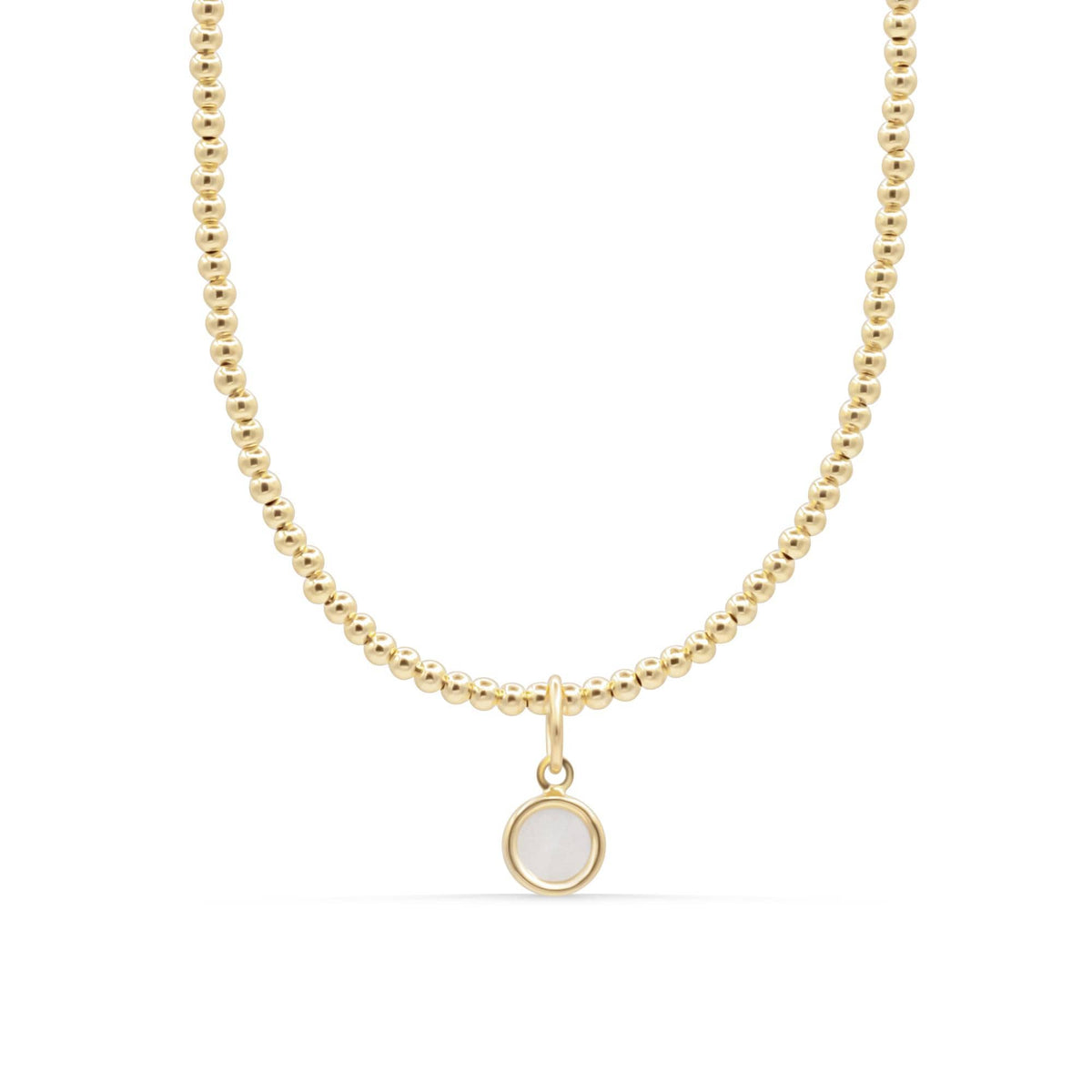 Elegant mother of pearl necklace with 14K gold chain from Earthly Abundance, showcasing the shimmering iridescent pendant.