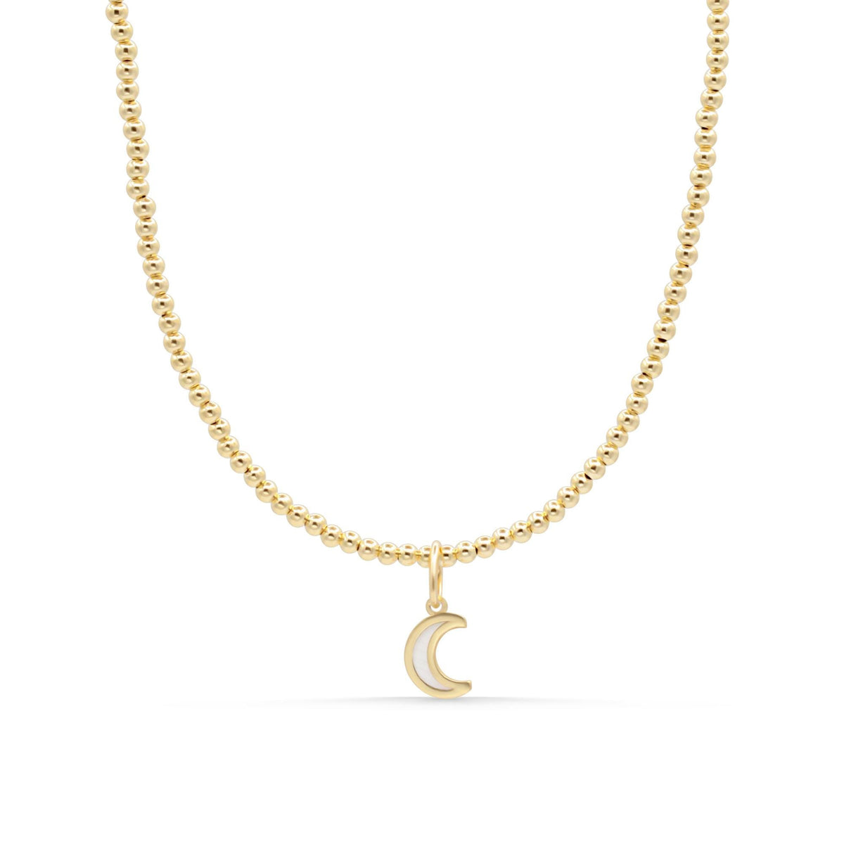 Elegant mother of pearl necklace with 14K gold chain from Earthly Abundance, showcasing a smooth, luminous pendant.
