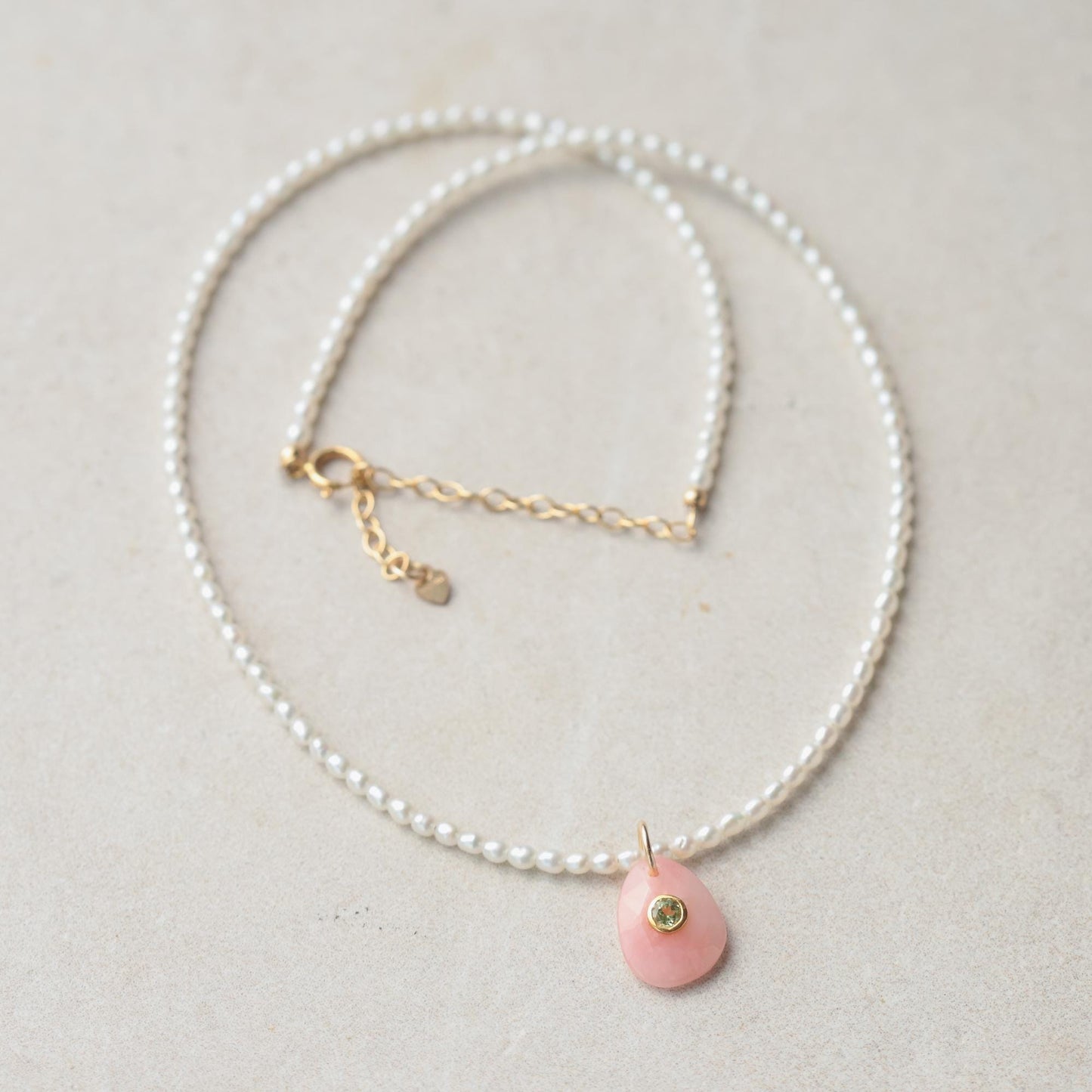 Gold-filled Pearl Whisper Choker by Earthly Abundance featuring a delicate pearl pendant on a fine gold chain.