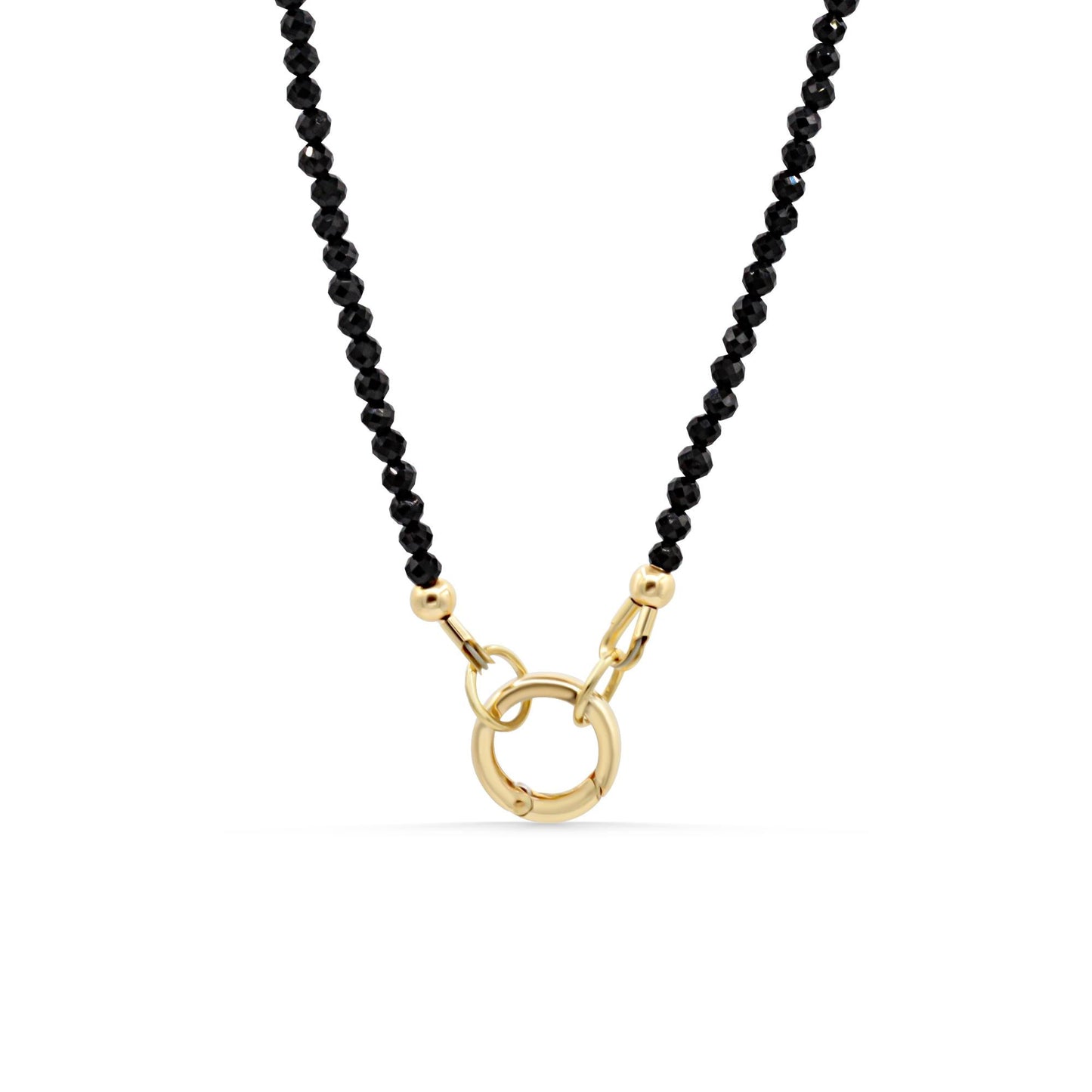 Lore Black Tourmaline Necklace in 14K gold from Earthly Abundance, featuring a polished black tourmaline pendant on a delicate chain.