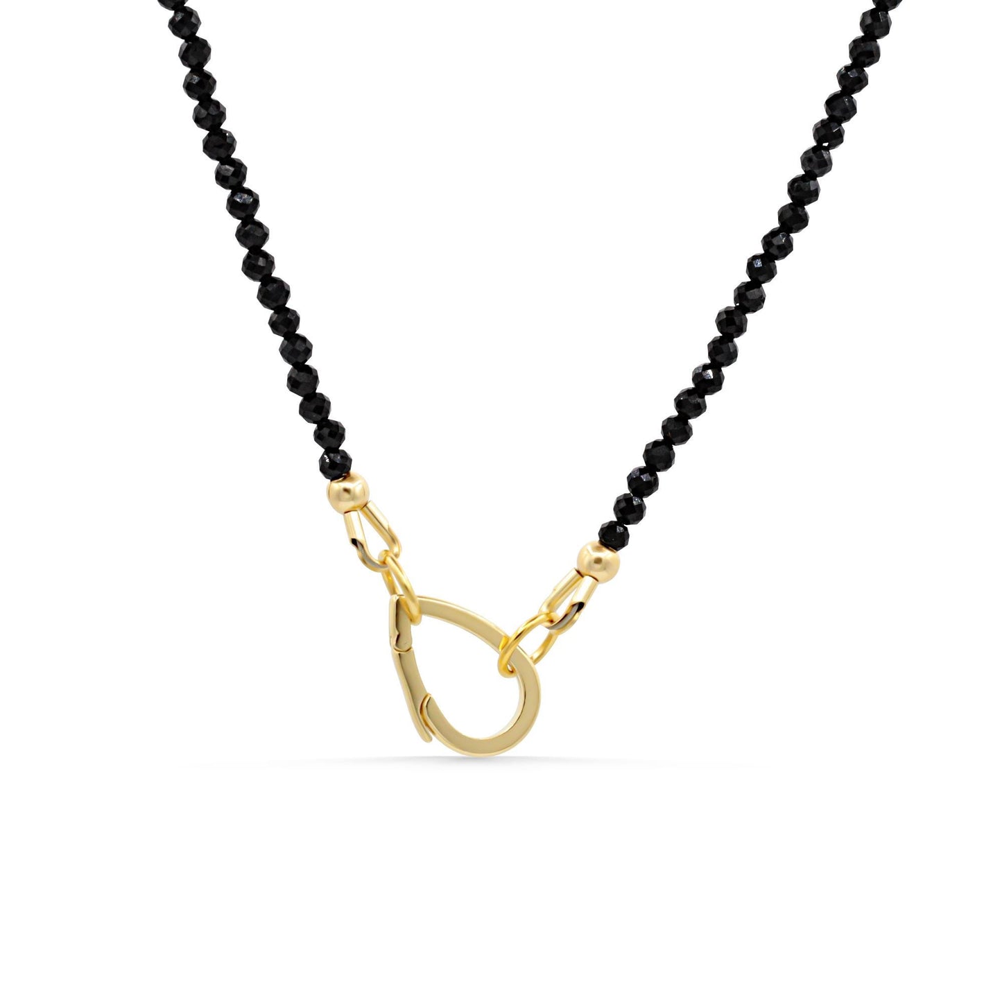 Black Tourmaline necklace with 14K gold accents by Earthly Abundance, featuring a sleek, polished pendant on a delicate chain.