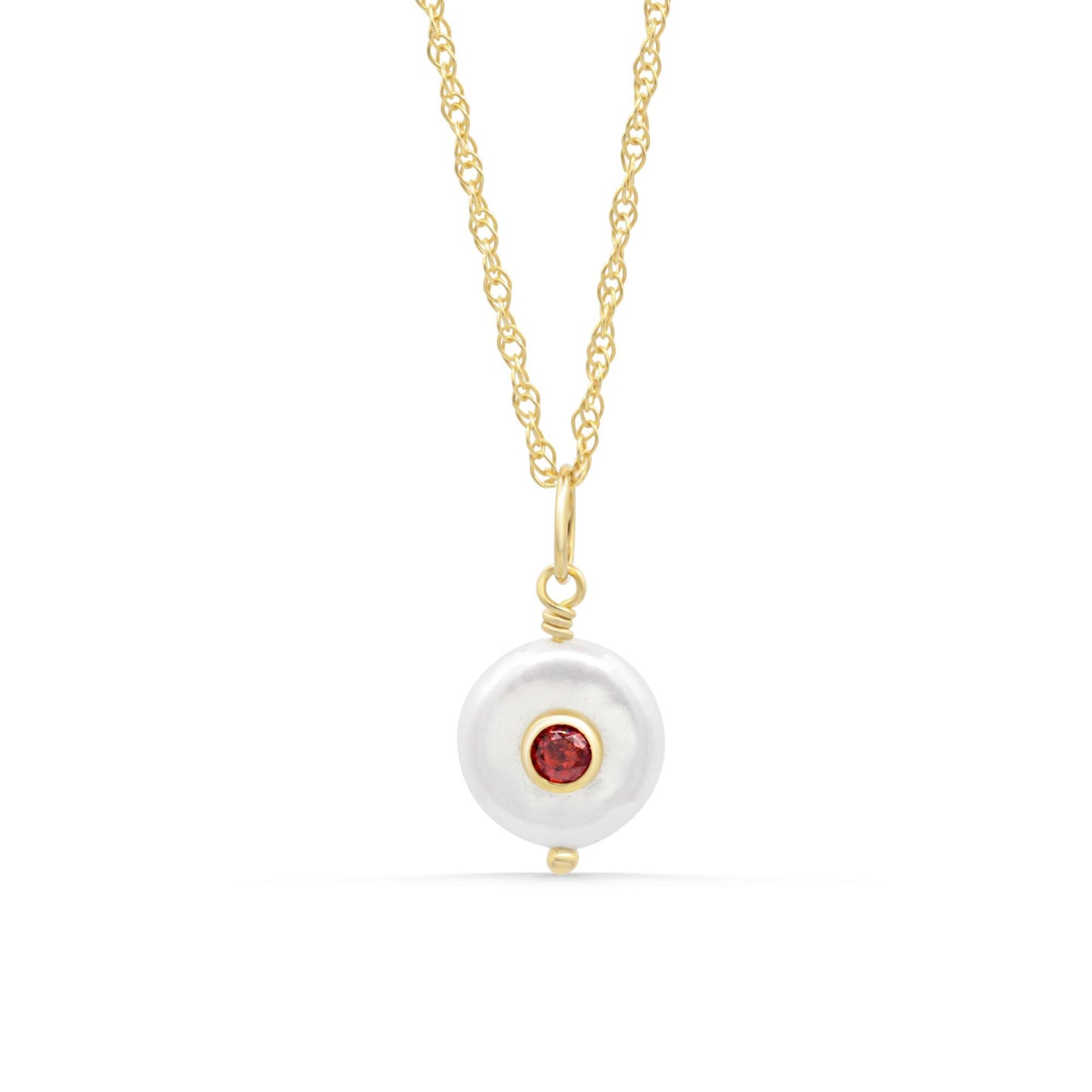 Ember Pendant featuring a pearl and garnet gemstone set in a silver pendant, displayed on a neutral background.