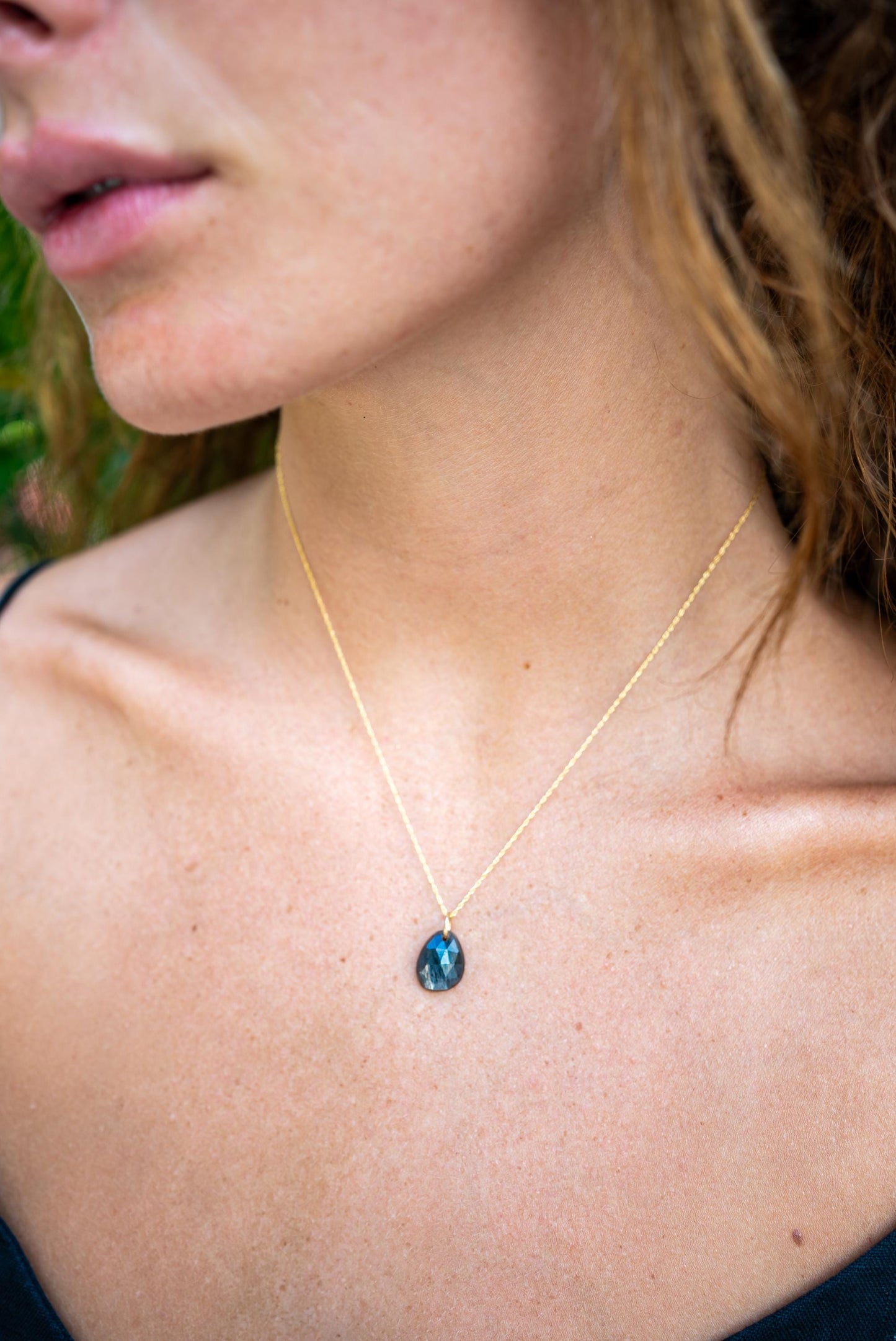 Golden sheen moonstone pendant necklace featuring a luminous moonstone set in a delicate chain, by Earthly Abundance.