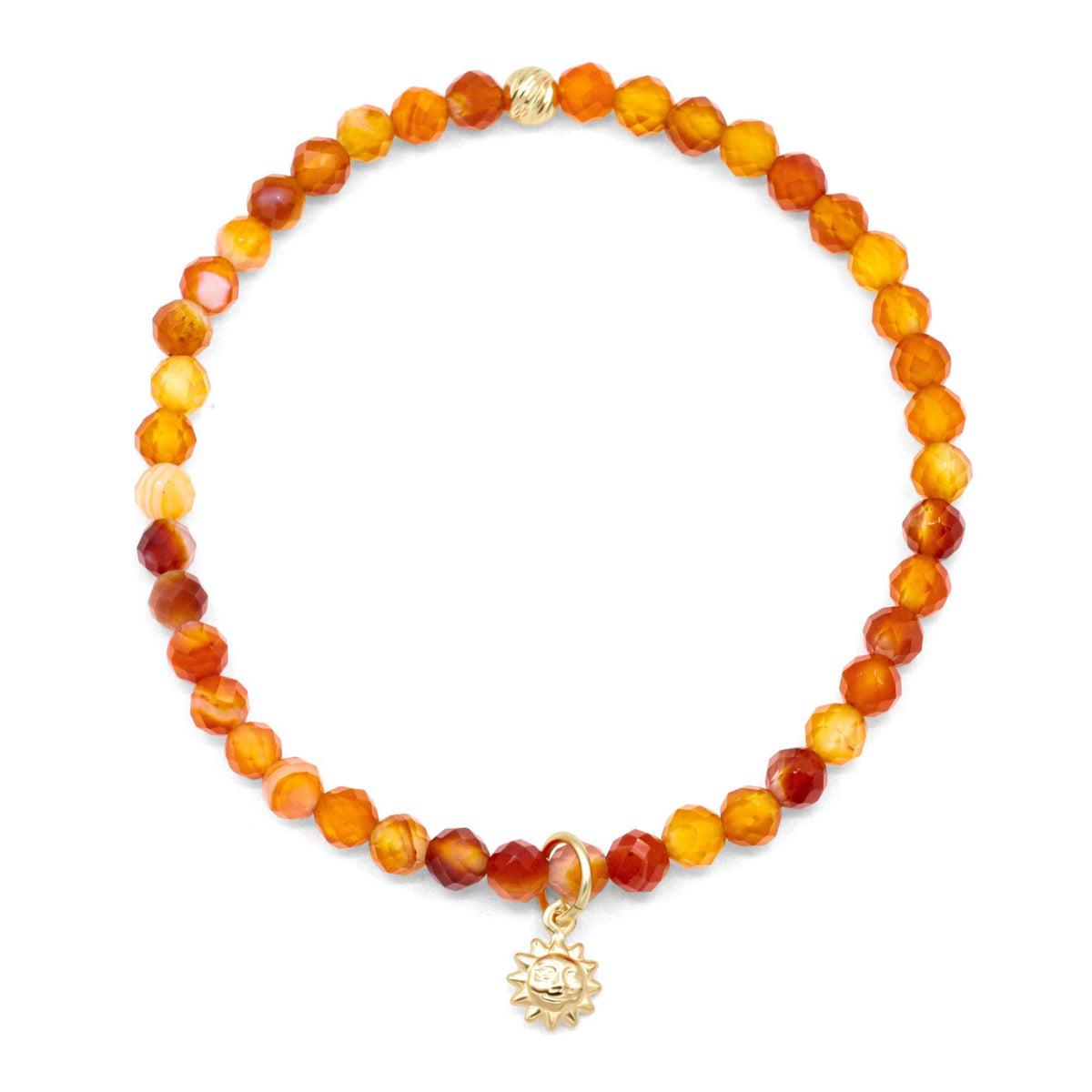 Mini Carnelian pendant in 14K gold from Earthly Abundance, featuring a vibrant orange carnelian gemstone with gold setting.
