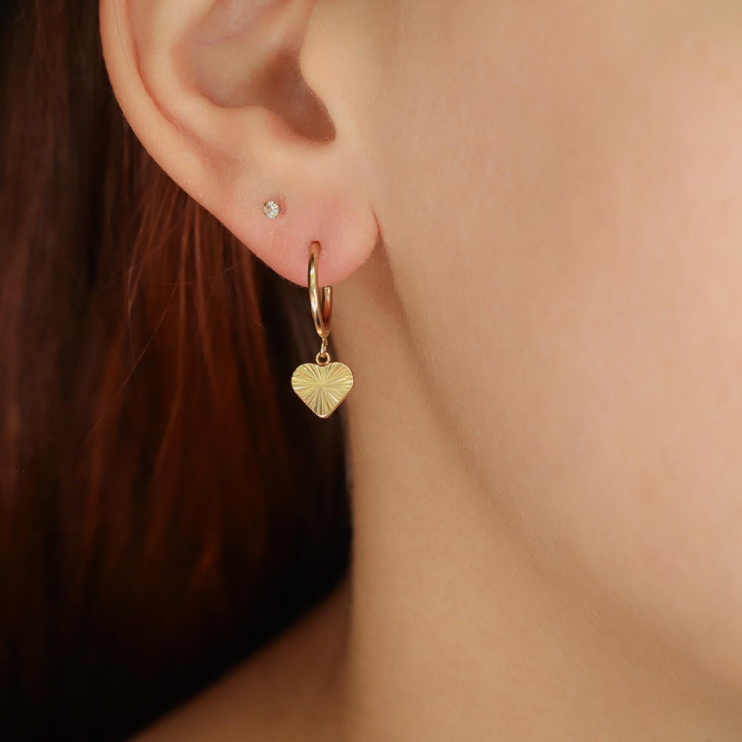 14K gold-filled Sunburst Heart Charm Earrings with intricate sunburst design and heart shape, from Earthly Abundance.