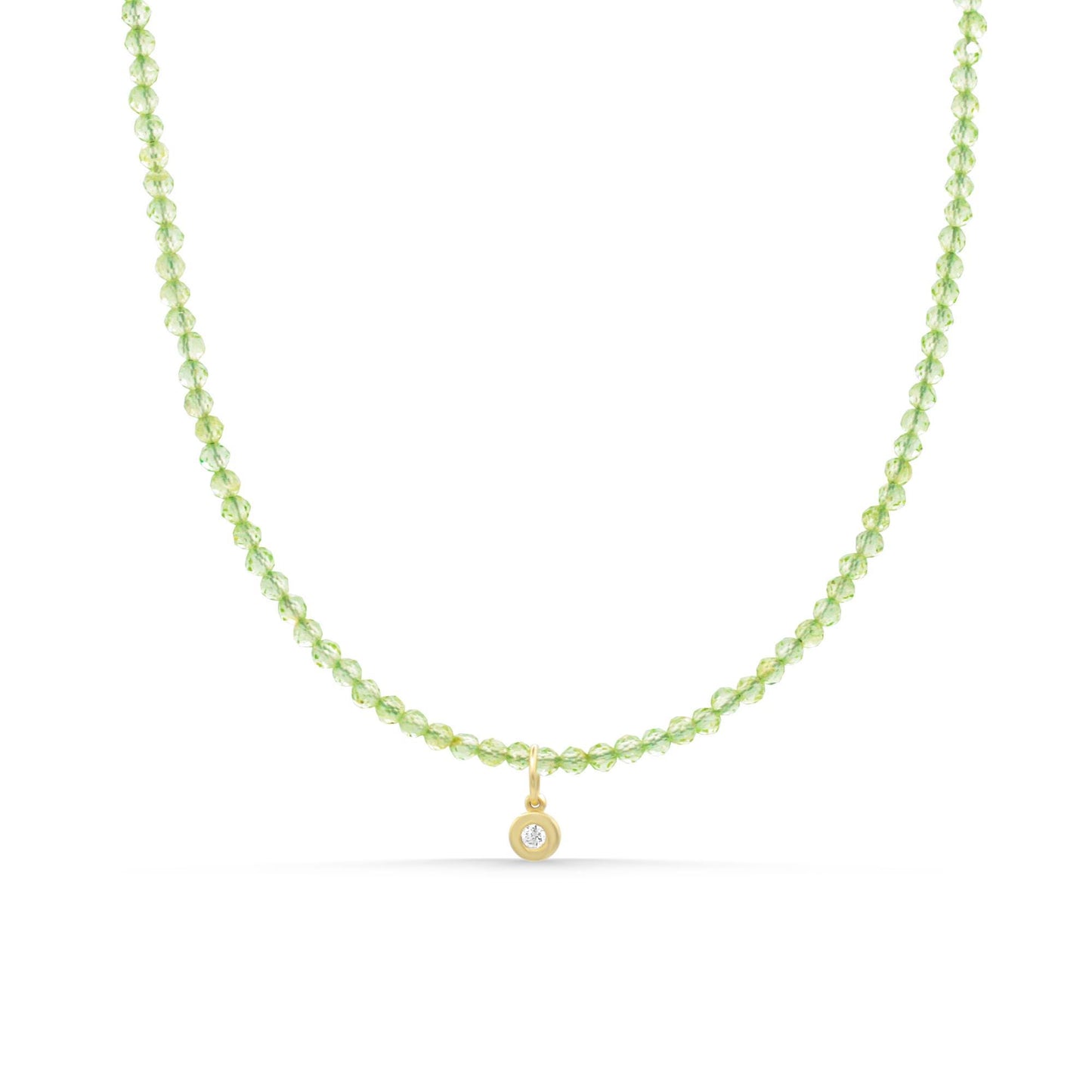 14K Peridot and diamond necklace featuring a vibrant green peridot gemstone and sparkling diamonds on a delicate chain.