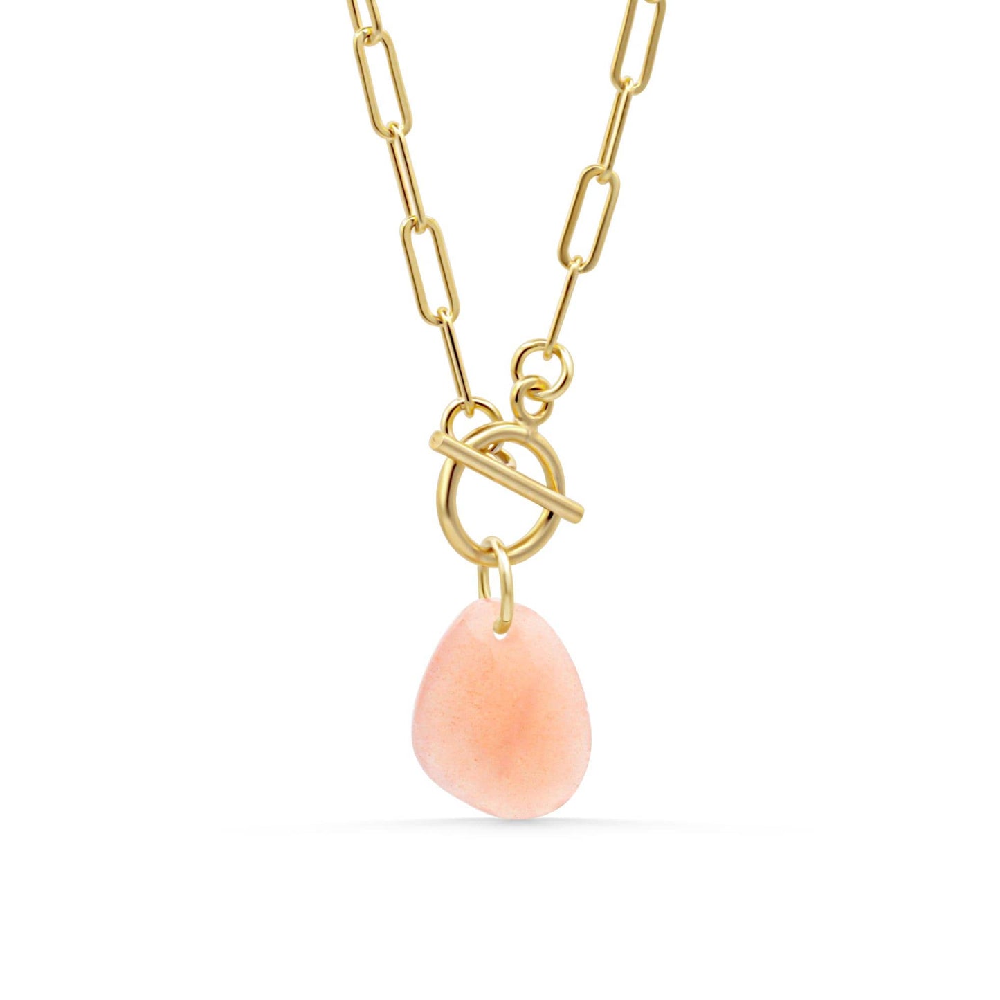 Peach moonstone toggle necklace by Earthly Abundance featuring a polished peach moonstone pendant on a toggle chain.