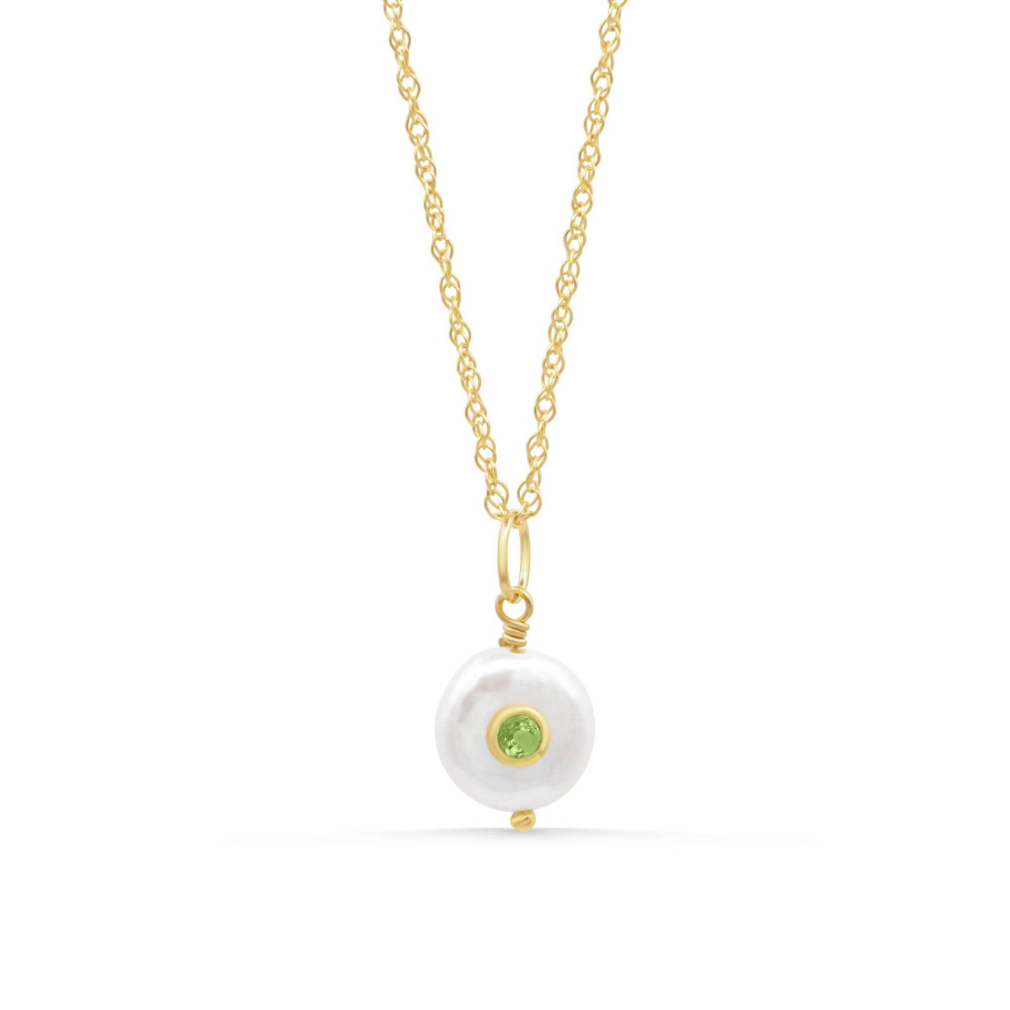 Verdant Pendant by Earthly Abundance featuring a pearl and peridot gemstone set in a delicate pendant necklace.