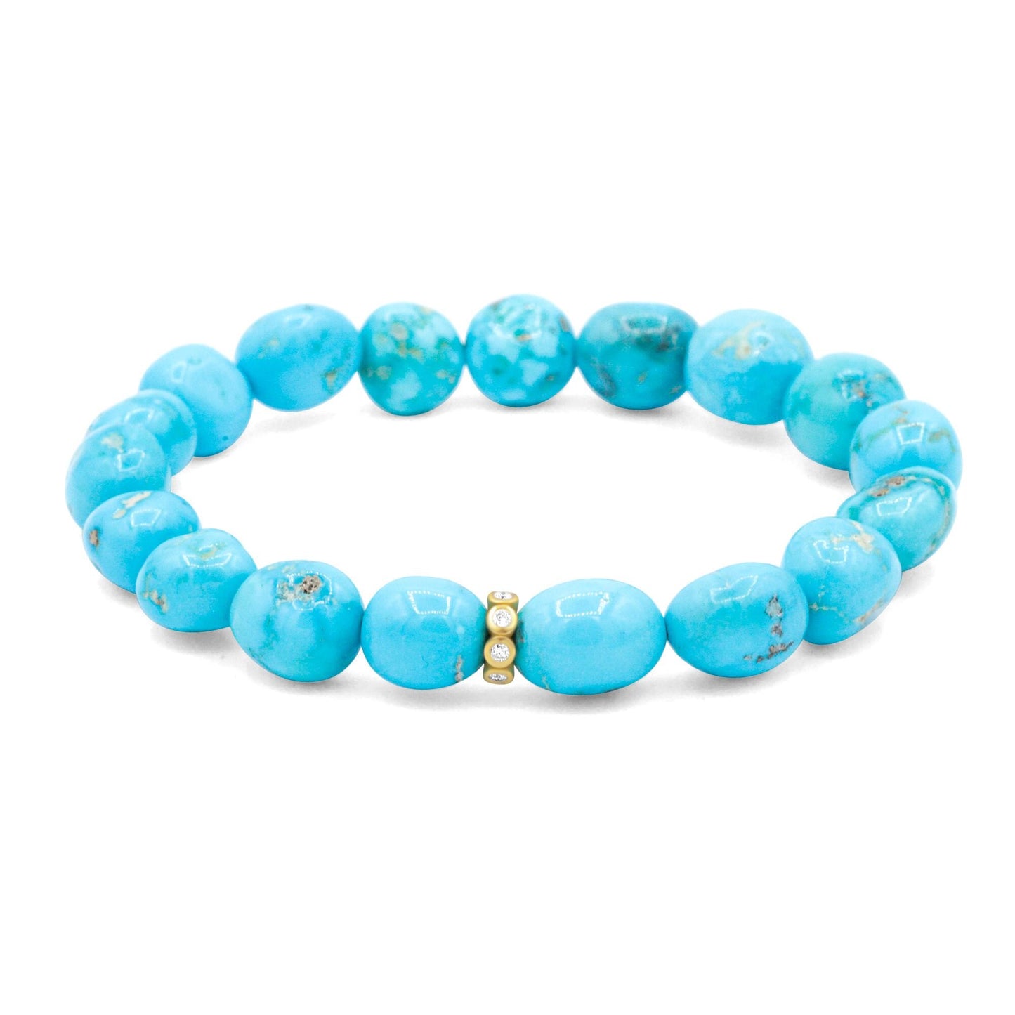 Blue Mesa Diamond Turquoise bracelet with 14K gold accents from Earthly Abundance, showcasing polished turquoise stones and delicate design.
