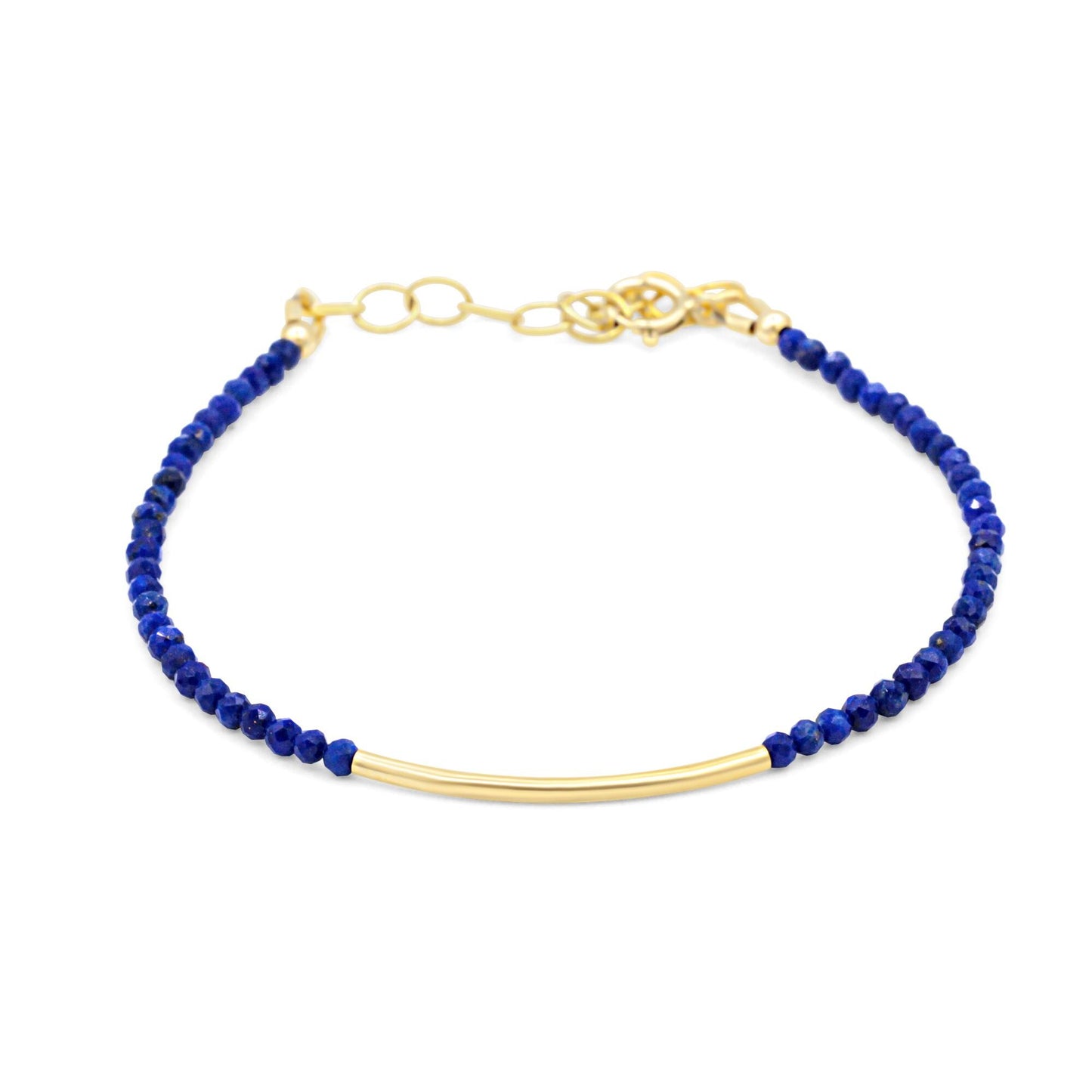 Dainty Lapis Lazuli bracelet by Earthly Abundance featuring polished blue gemstone beads on a delicate elastic band