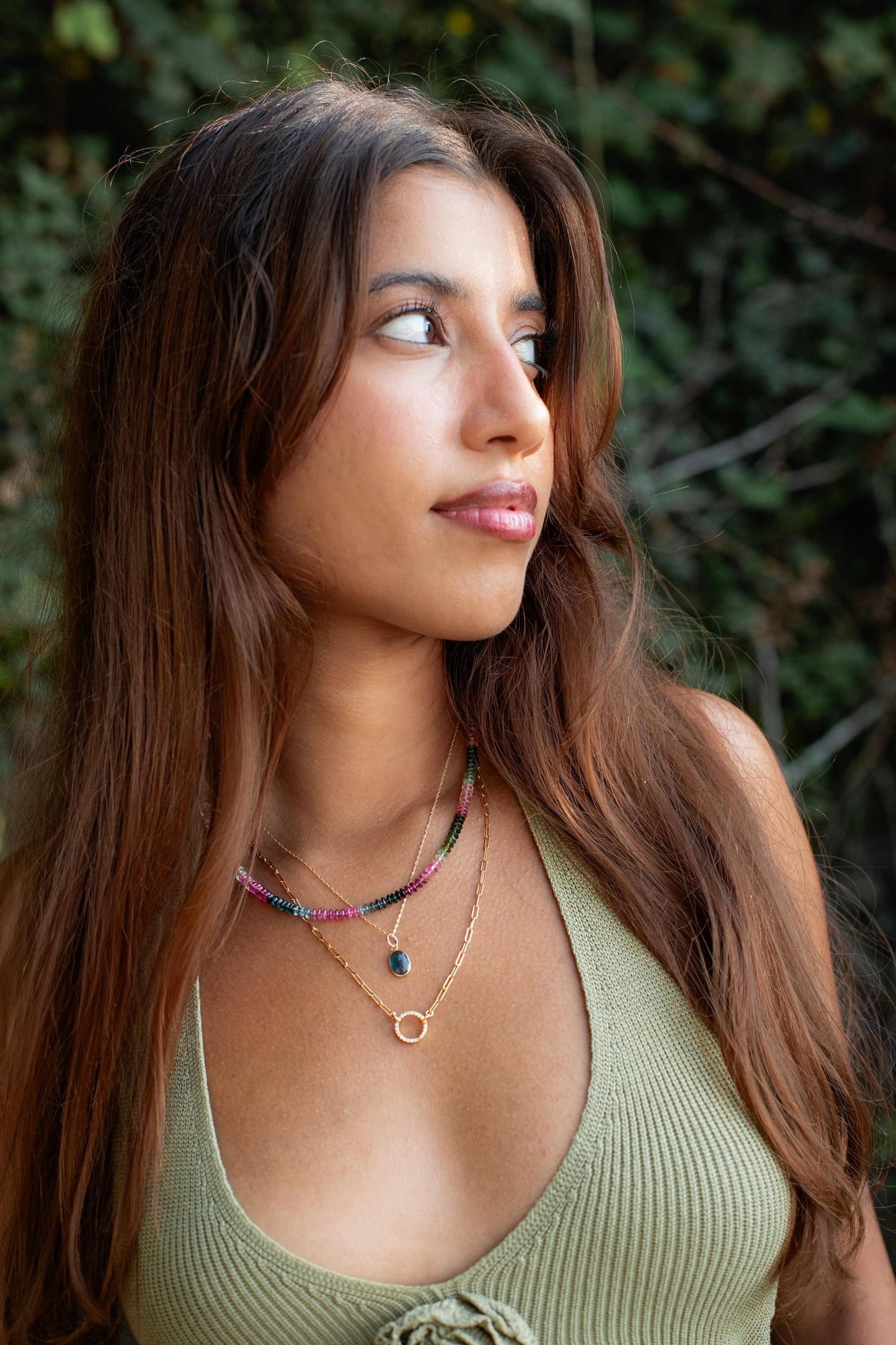 Azure Horizon Moss Kyanite necklace with 14K gold chain from Earthly Abundance, featuring a vibrant blue-green gemstone pendant.