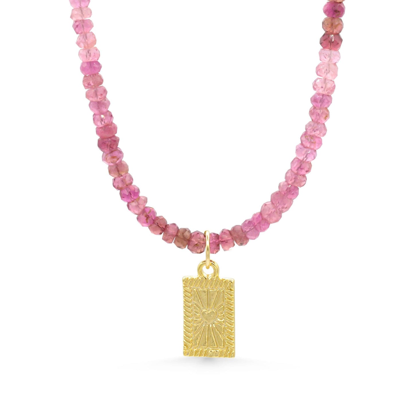 Pink Tourmaline Necklace from Earthly Abundance with a heart-shaped pendant, featuring vibrant pink stones on a delicate chain.
