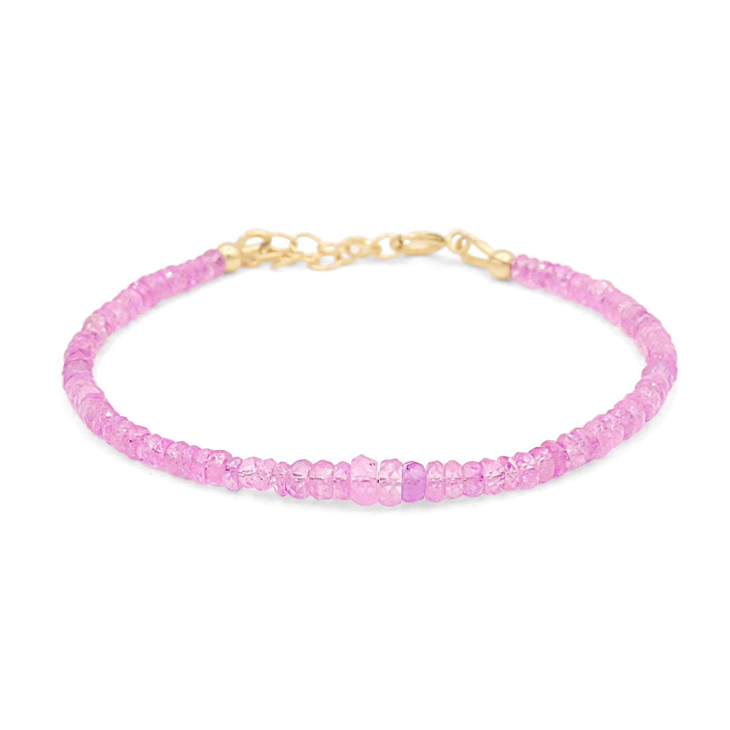 Baby pink sapphire bracelet in 14K gold featuring delicate pink sapphires, elegant jewelry piece from Earthly Abundance.