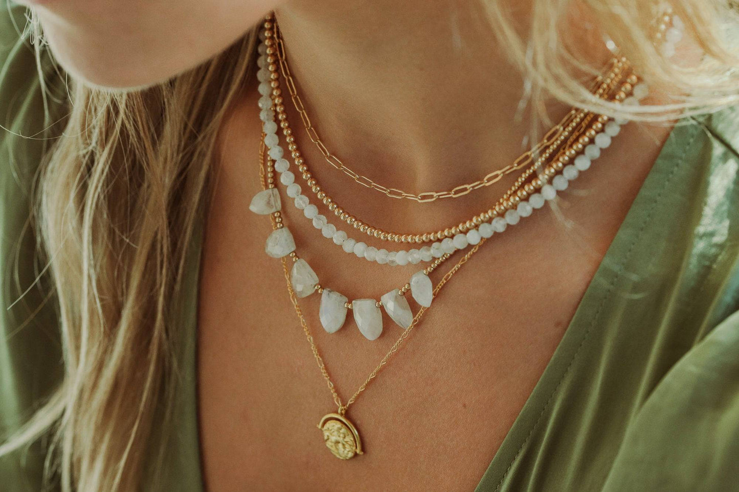 Small 14K gold-filled paperclip chain necklace by Earthly Abundance Jewelry, featuring interconnected elongated links.