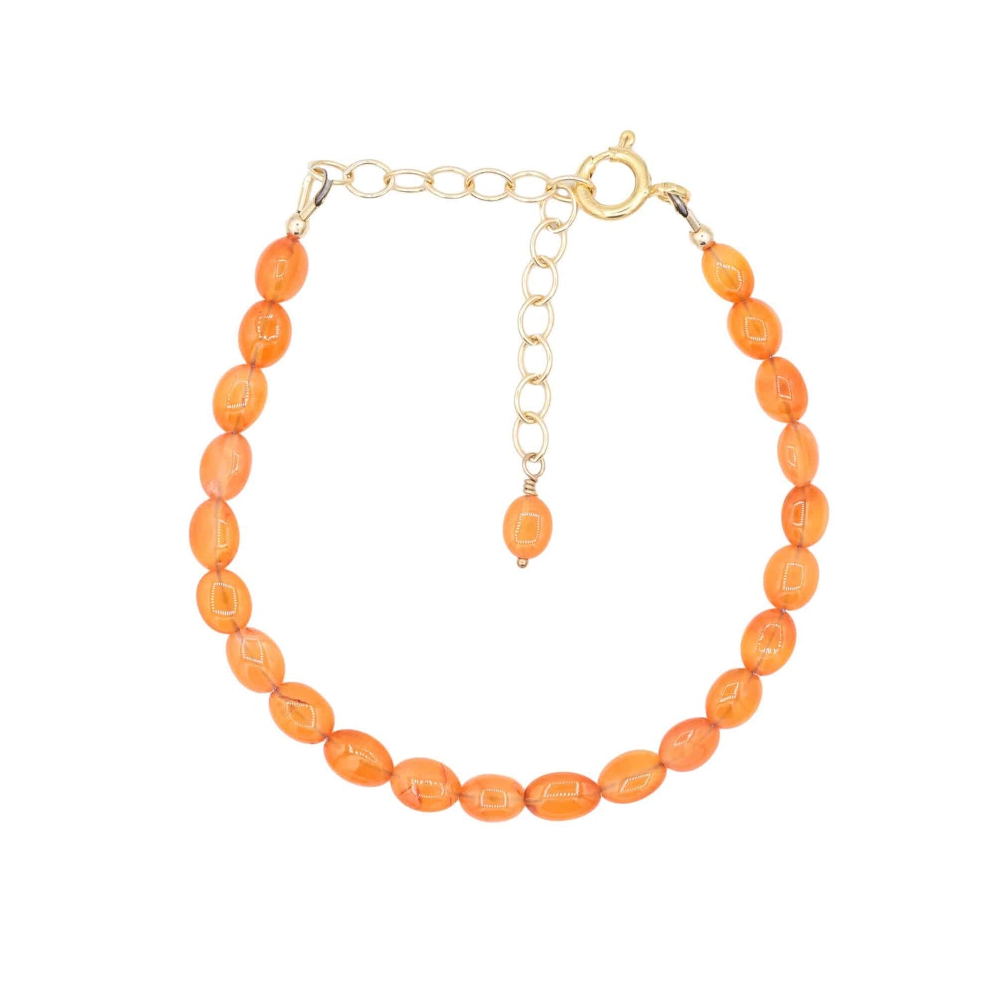 Earthly Abundance Carnelian nugget bracelet featuring polished orange-red stones on an elastic band, close-up view of the jewelry.